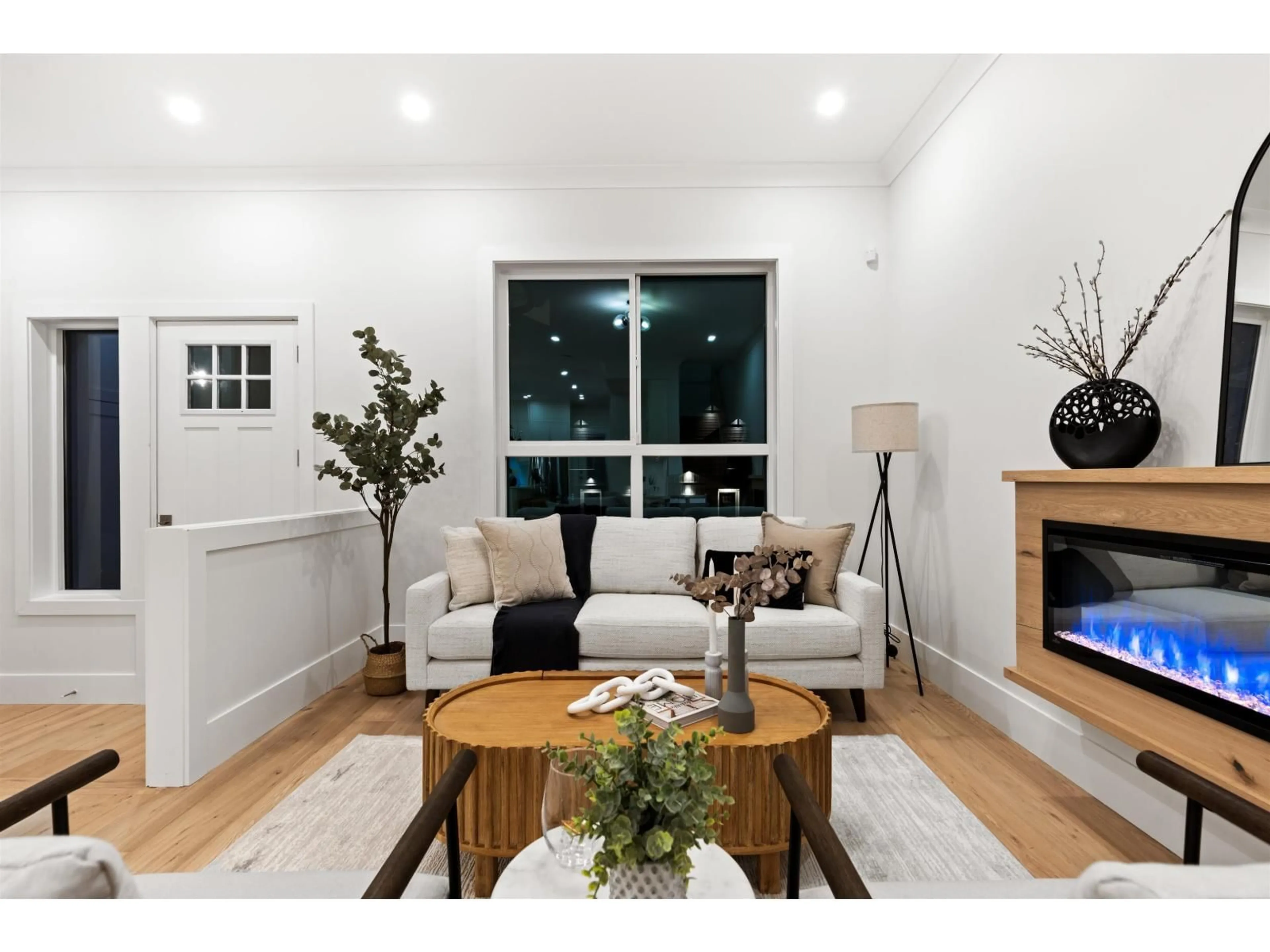 Living room with furniture, wood/laminate floor for 102 - 16623 18A AVENUE, Surrey British Columbia V3Z9X5