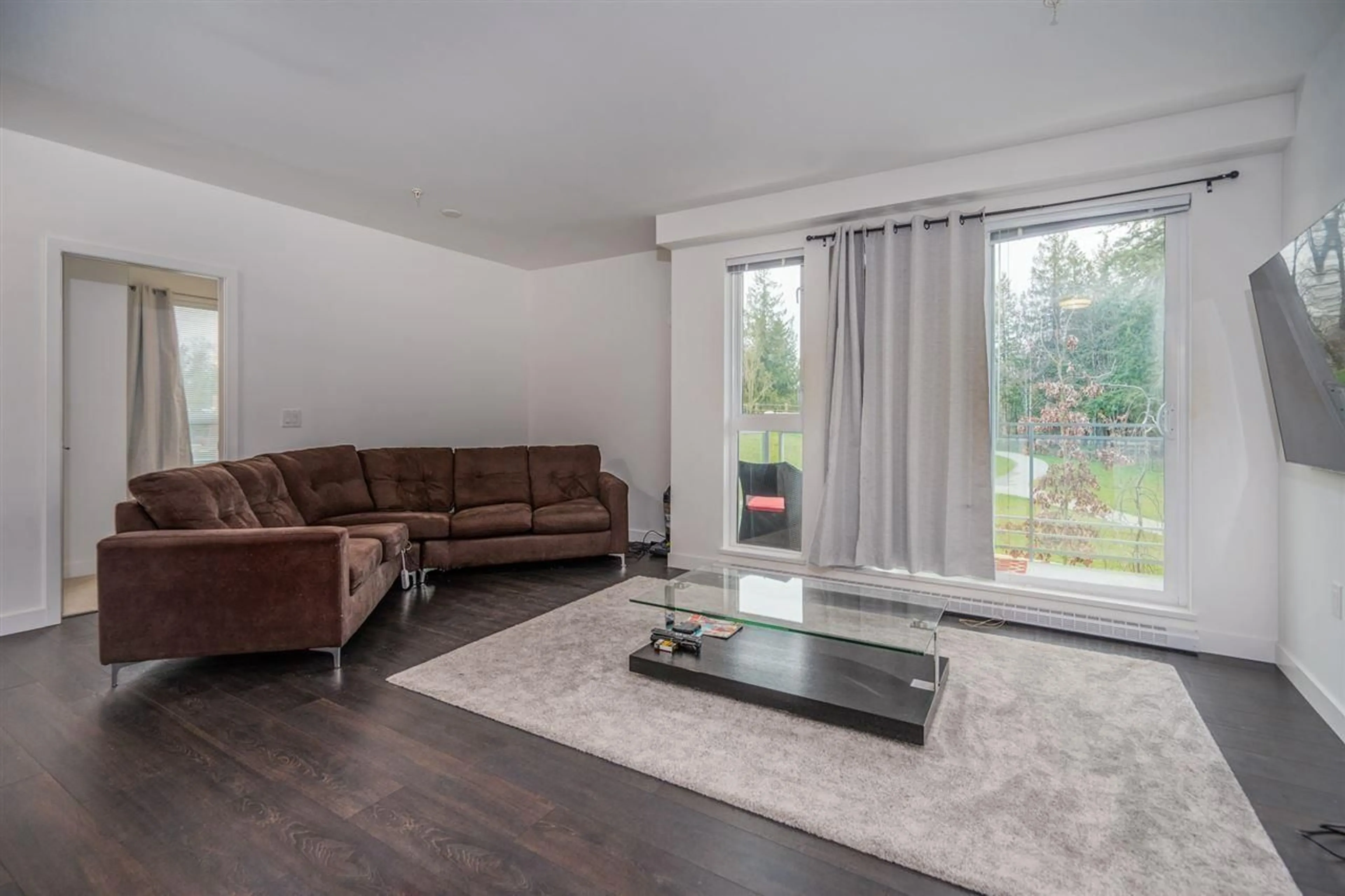 Living room with furniture, unknown for 214 - 13963 105 BOULEVARD, Surrey British Columbia V3T0M9