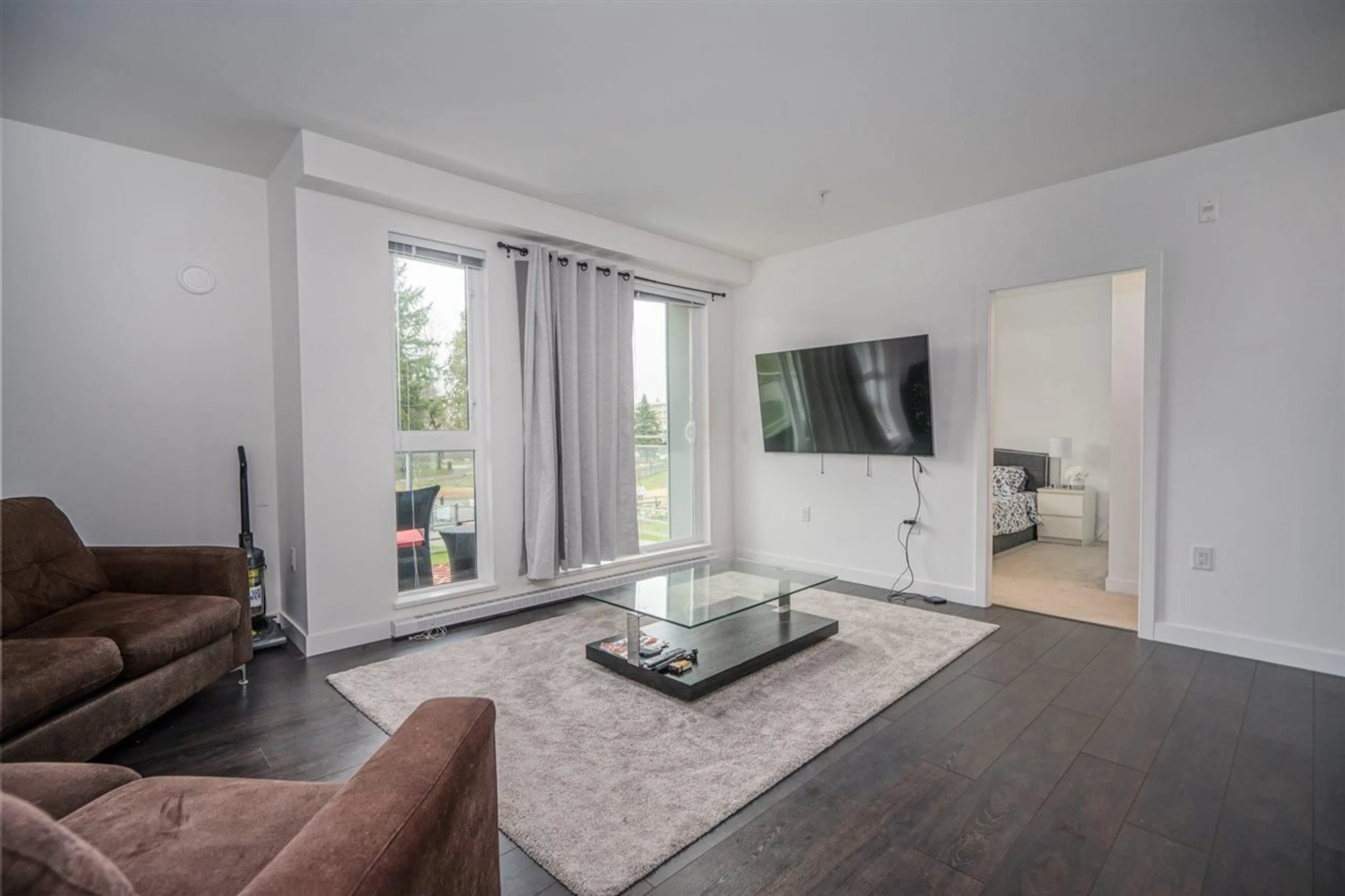 Living room with furniture, unknown for 214 - 13963 105 BOULEVARD, Surrey British Columbia V3T0M9