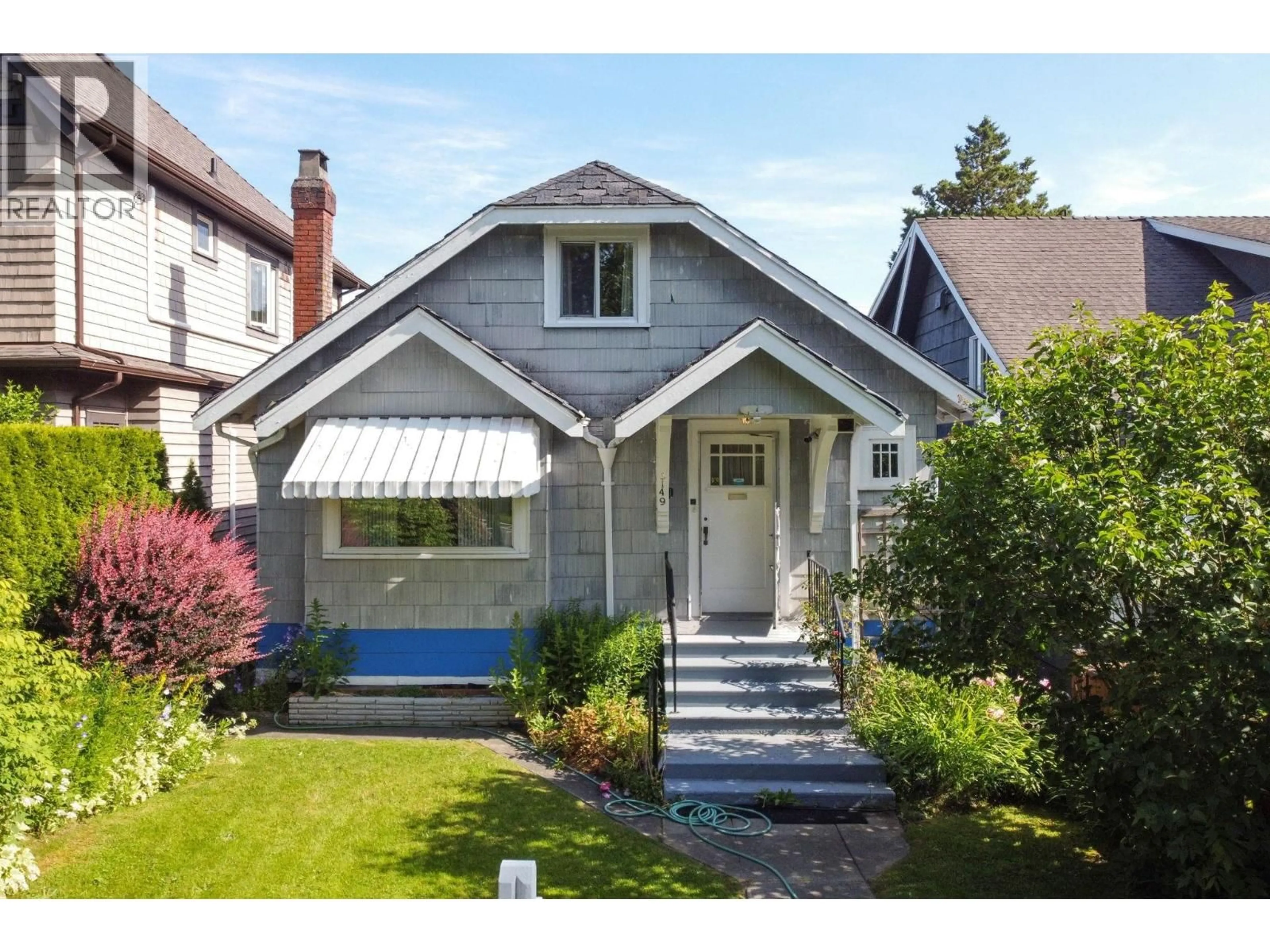 Home with vinyl exterior material, street for 3149 KING EDWARD AVENUE, Vancouver British Columbia V6L1V4