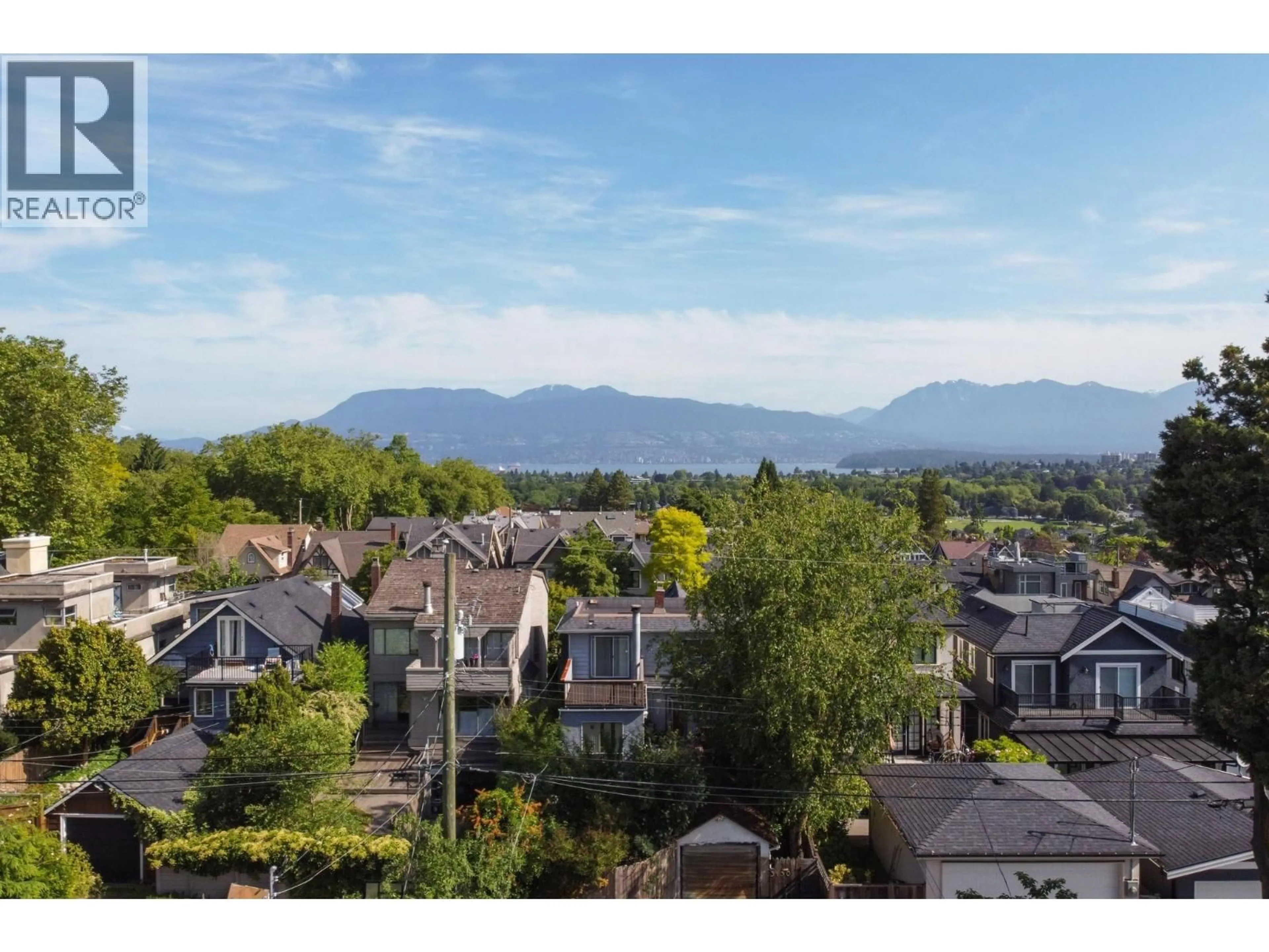 A pic from outside/outdoor area/front of a property/back of a property/a pic from drone, mountain view for 3149 KING EDWARD AVENUE, Vancouver British Columbia V6L1V4