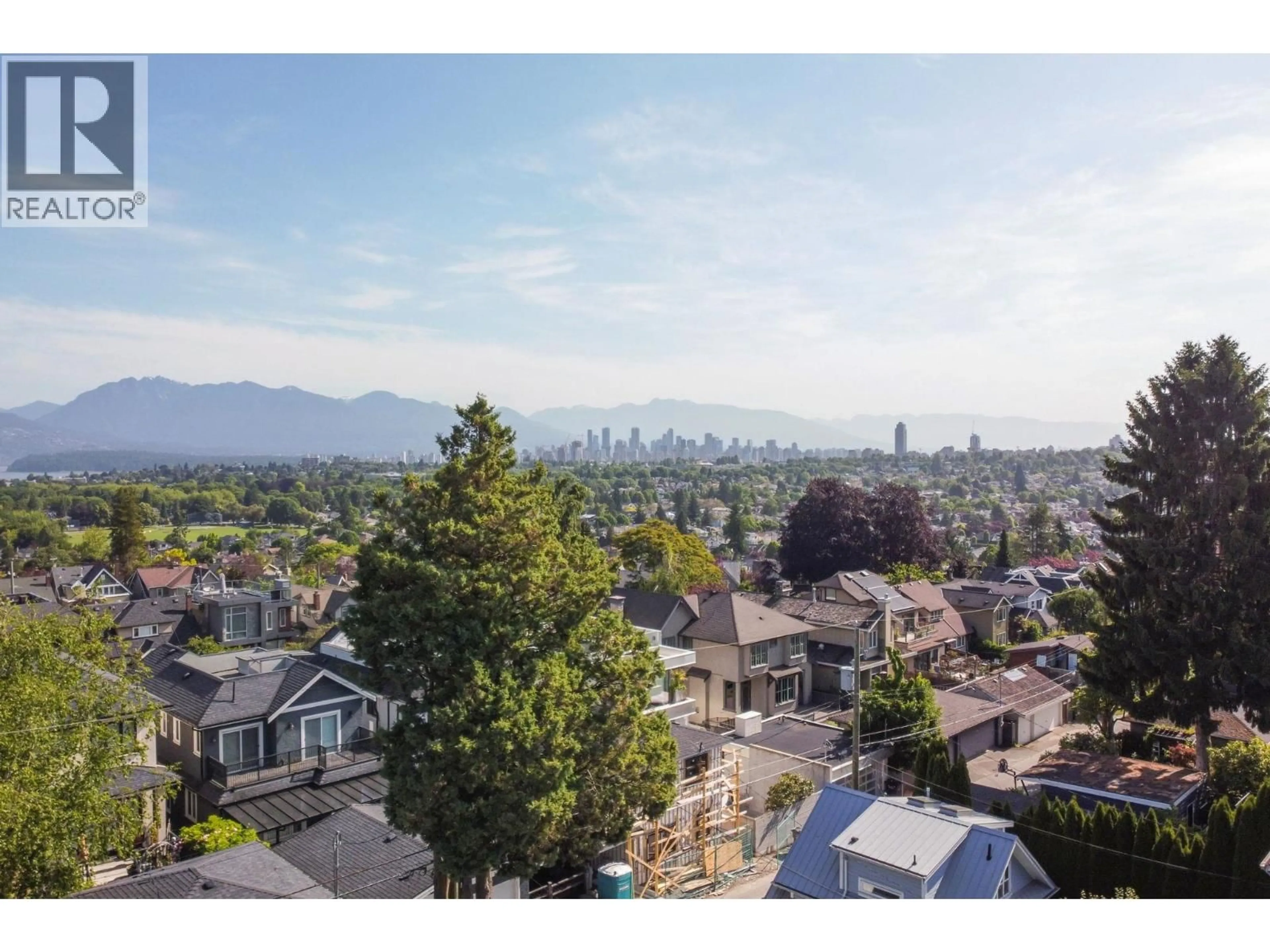 A pic from outside/outdoor area/front of a property/back of a property/a pic from drone, mountain view for 3149 KING EDWARD AVENUE, Vancouver British Columbia V6L1V4