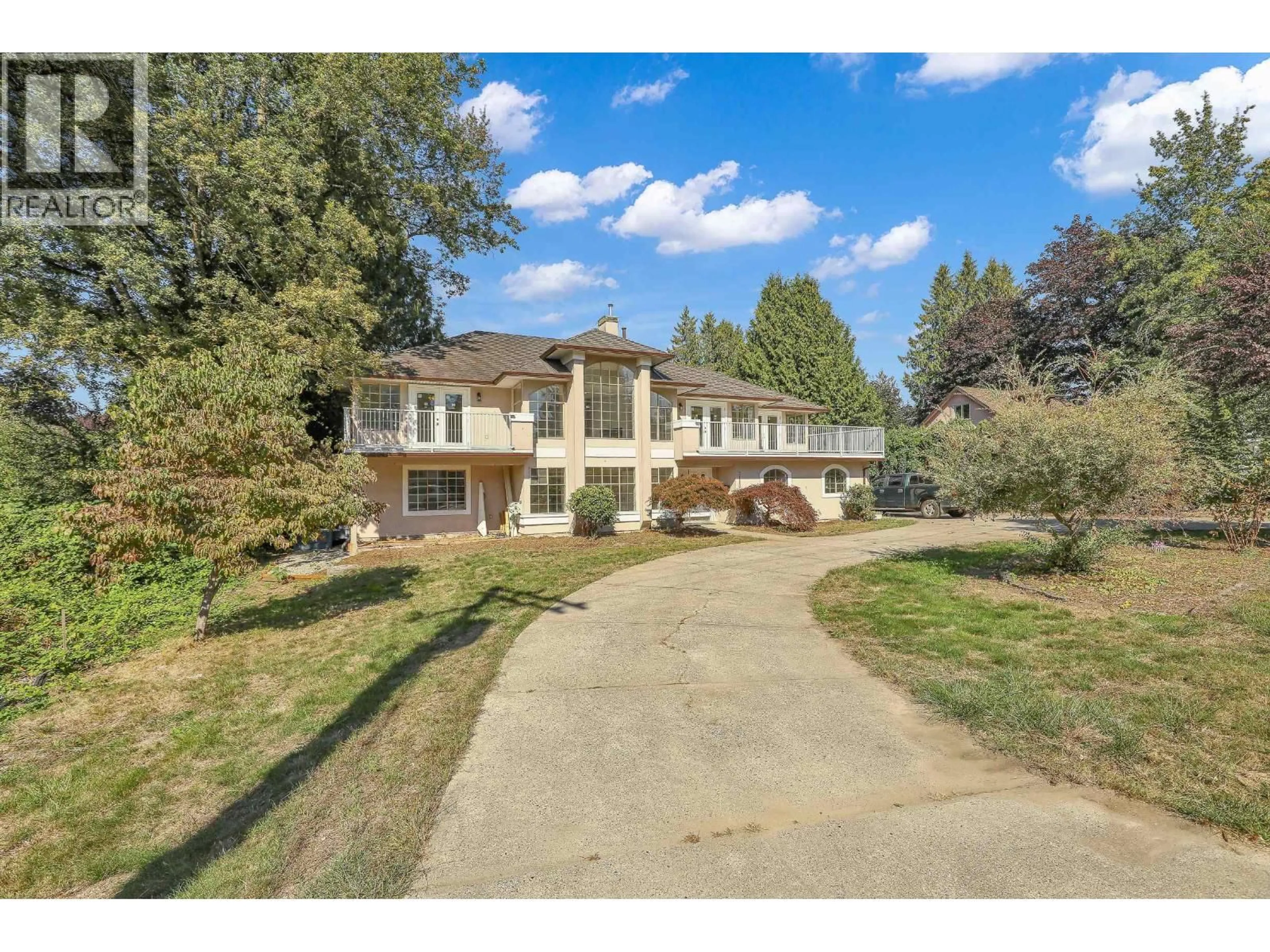 A pic from outside/outdoor area/front of a property/back of a property/a pic from drone, street for 21105 RIVER ROAD, Maple Ridge British Columbia V2X2A1