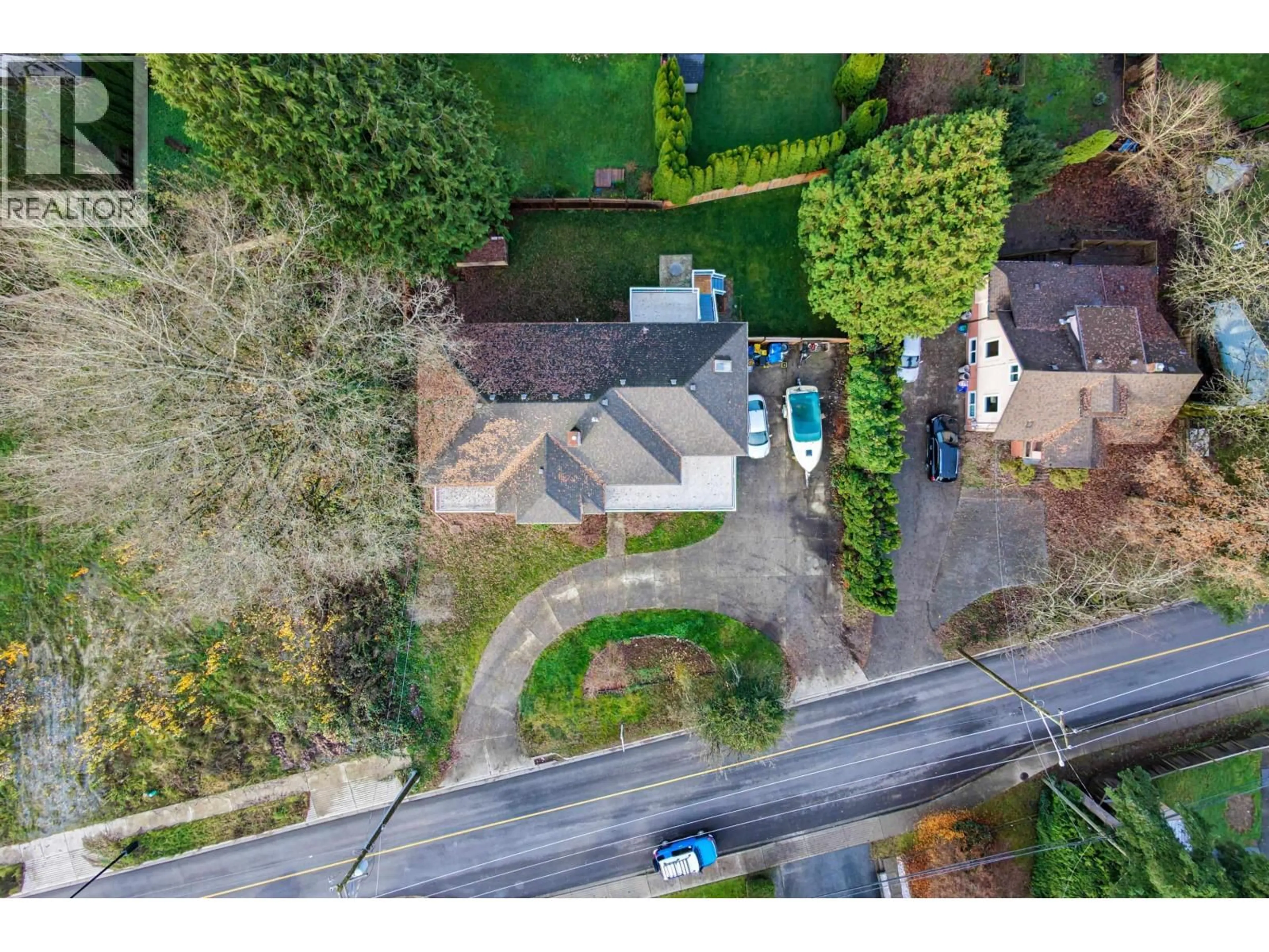 A pic from outside/outdoor area/front of a property/back of a property/a pic from drone, street for 21105 RIVER ROAD, Maple Ridge British Columbia V2X2A1