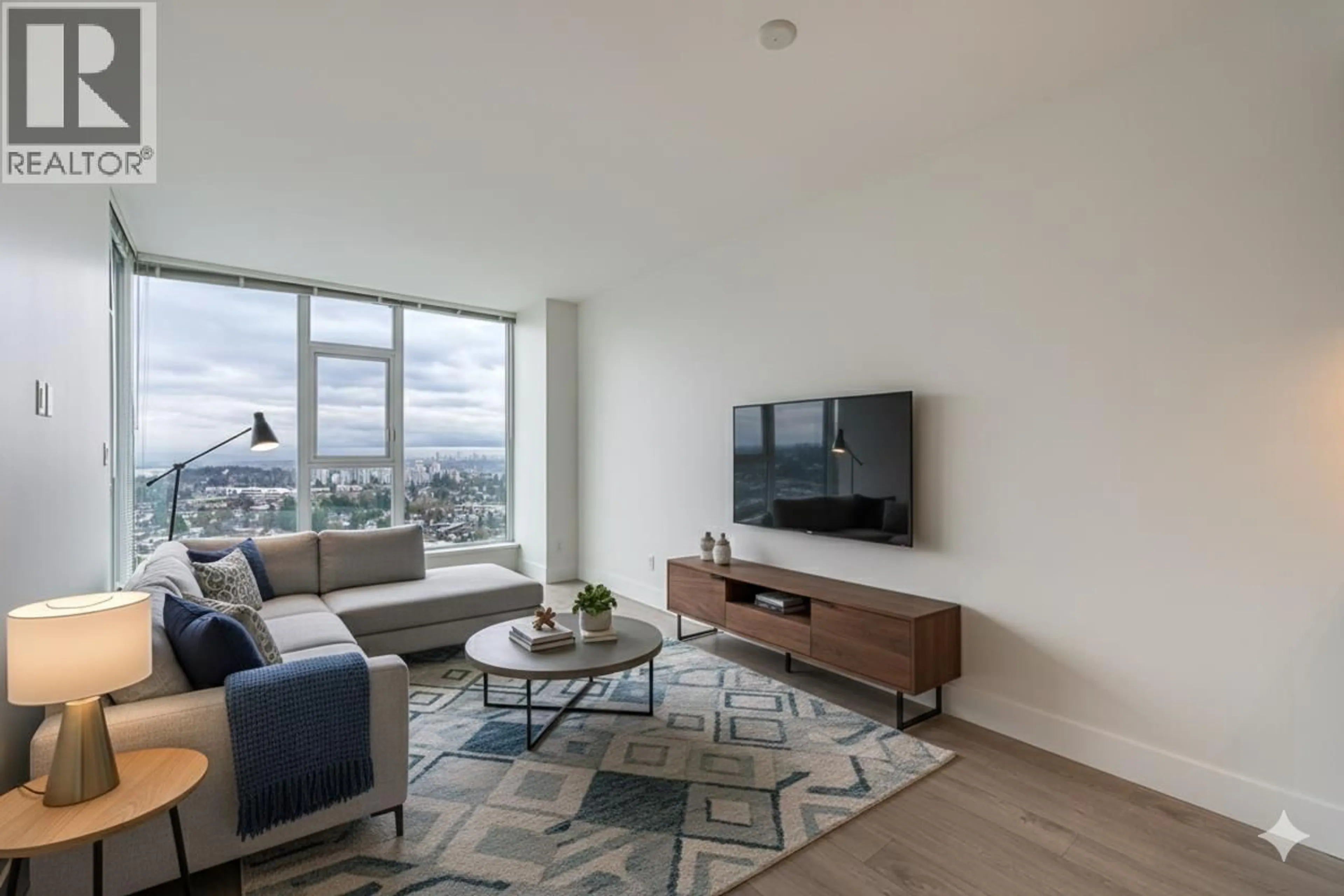 Living room with furniture, unknown for 2506 - 7388 KINGSWAY, Burnaby British Columbia V3N0G9