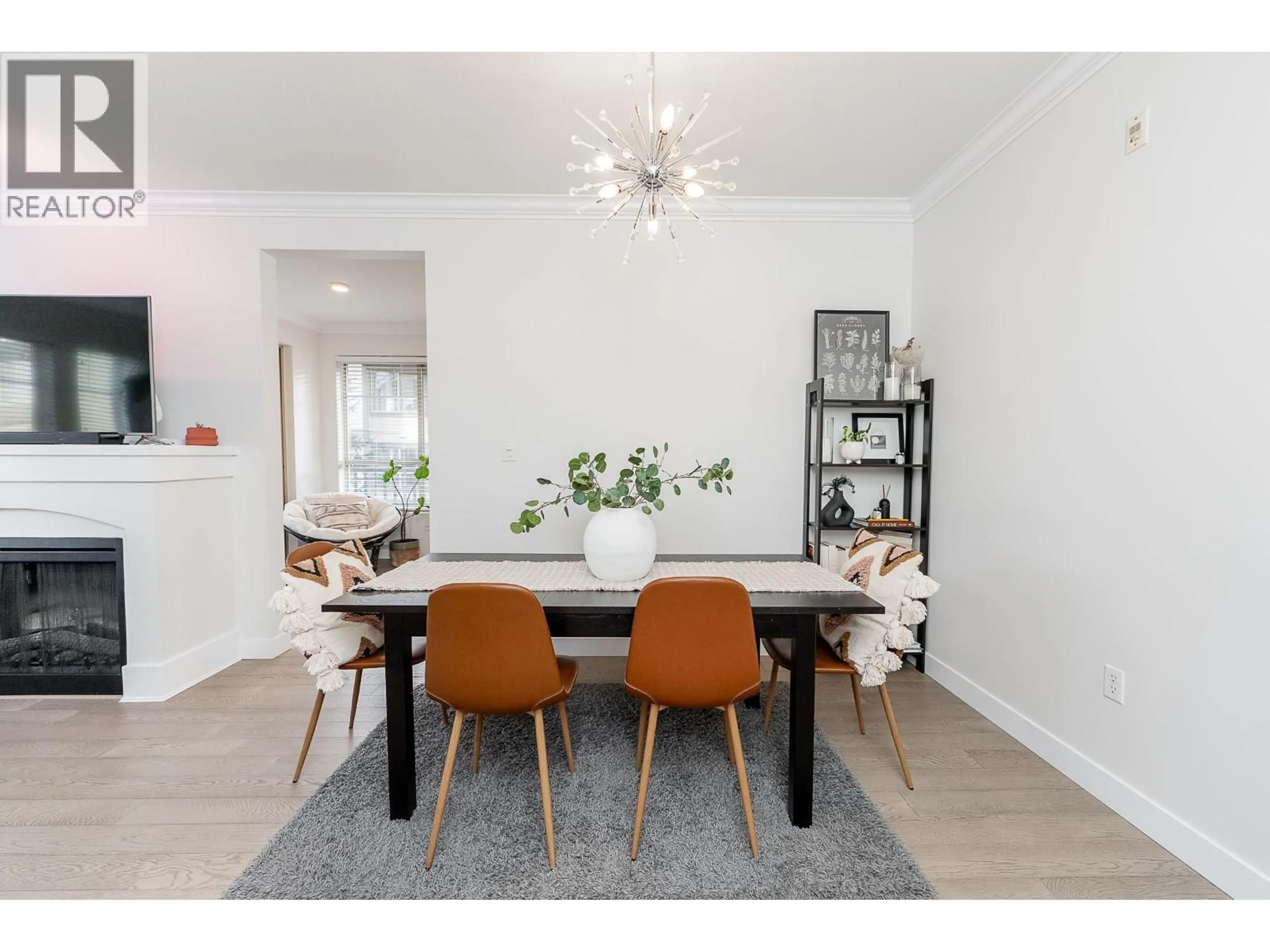 Dining room, wood/laminate floor for 208 - 2969 WHISPER WAY, Coquitlam British Columbia V3E3S8