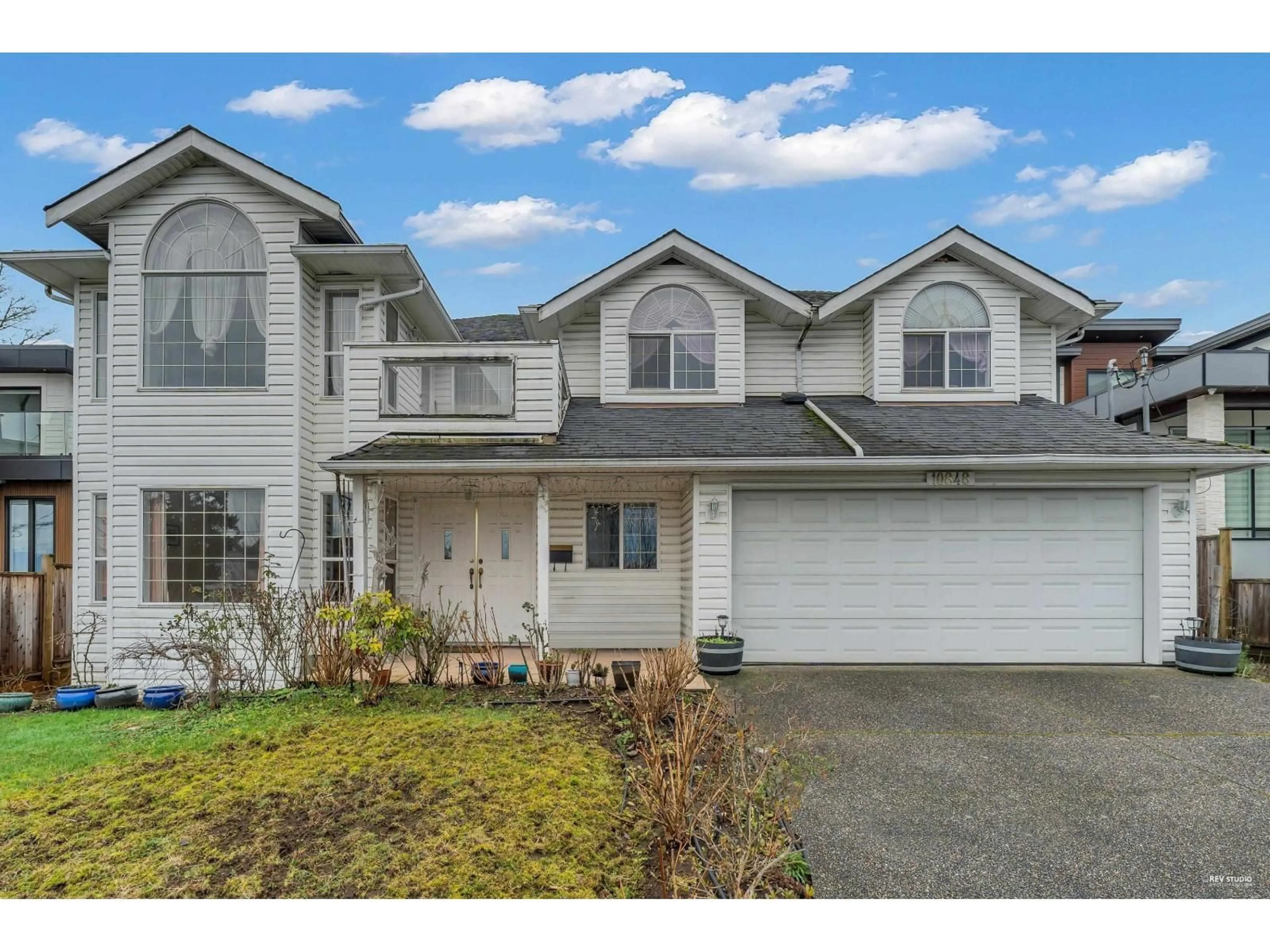 Home with vinyl exterior material, street for 10848 129A STREET, Surrey British Columbia V3T3K6