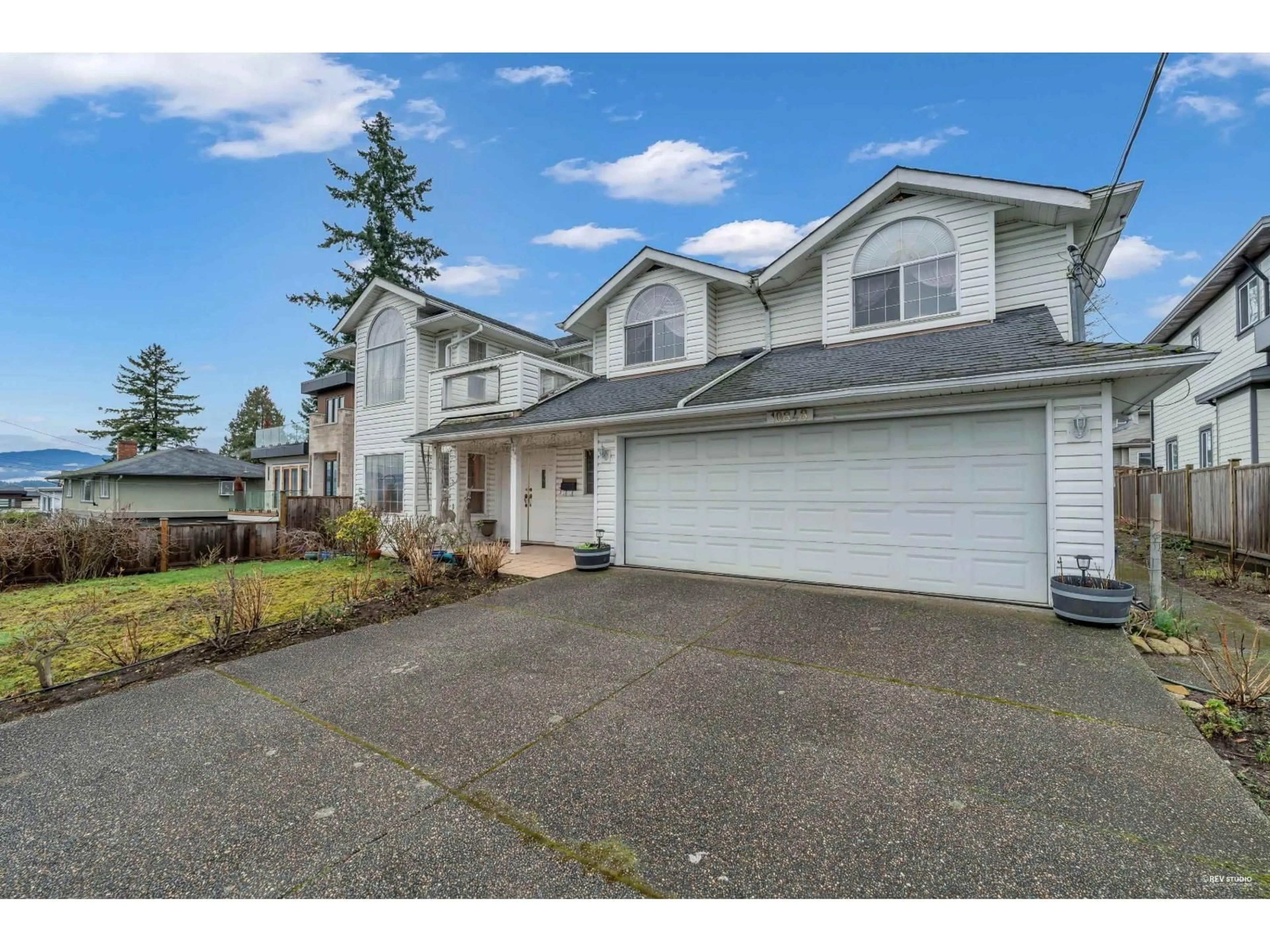 Home with vinyl exterior material, street for 10848 129A STREET, Surrey British Columbia V3T3K6