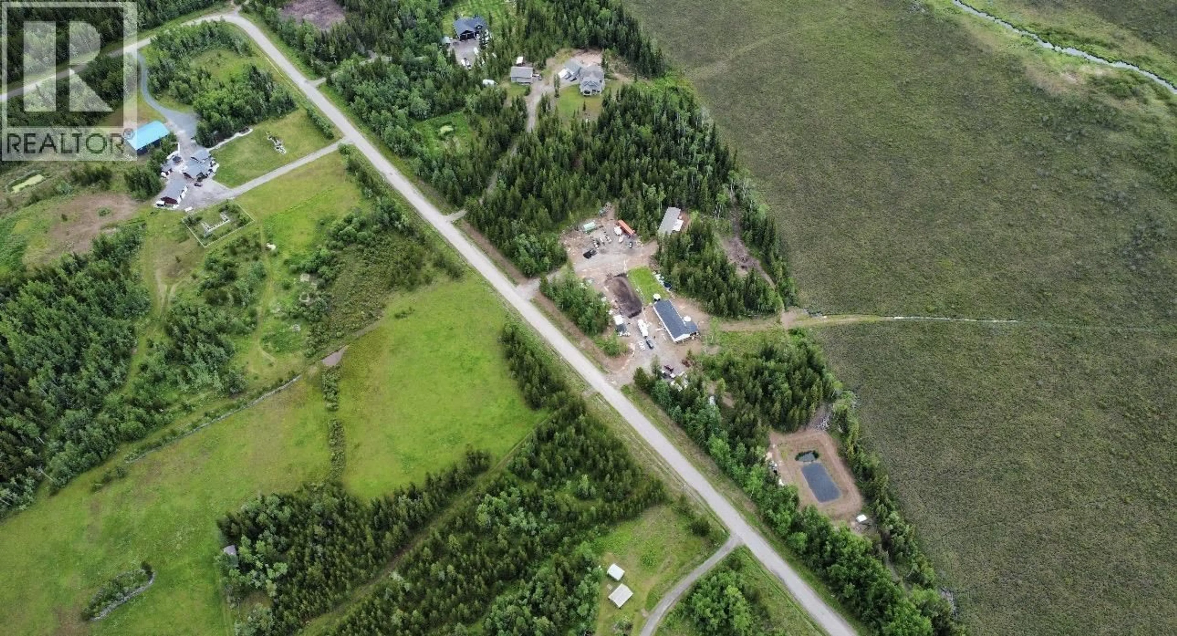 A pic from outside/outdoor area/front of a property/back of a property/a pic from drone, street for 18710 HUGHES ROAD, Prince George British Columbia V2N6S2