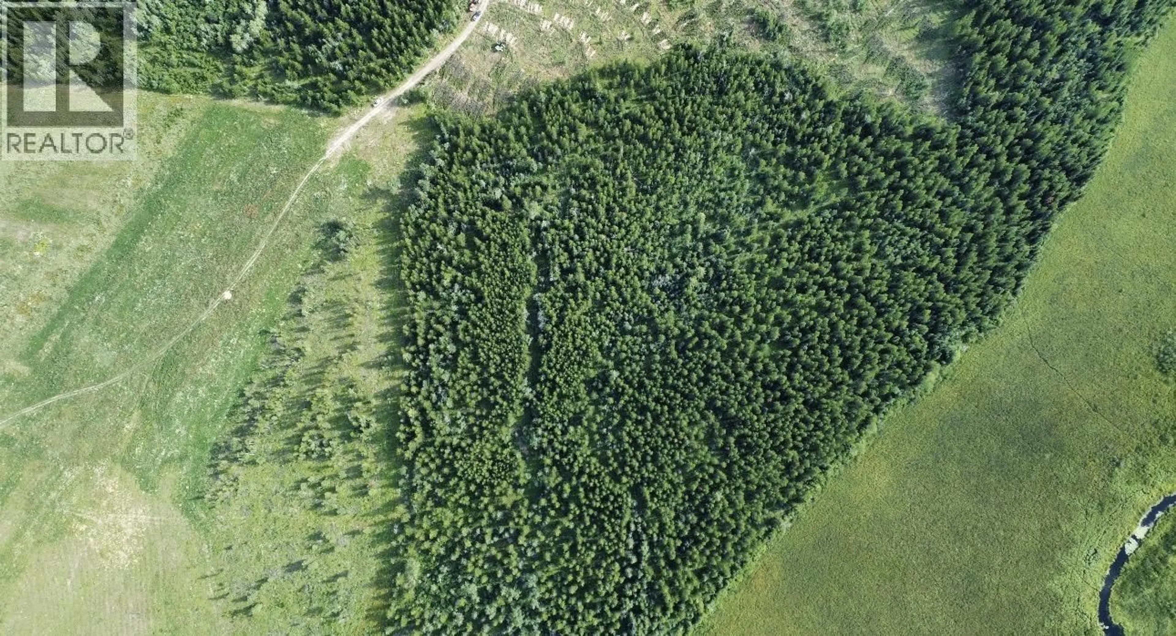 A pic from outside/outdoor area/front of a property/back of a property/a pic from drone, forest/trees view for 18710 HUGHES ROAD, Prince George British Columbia V2N6S2