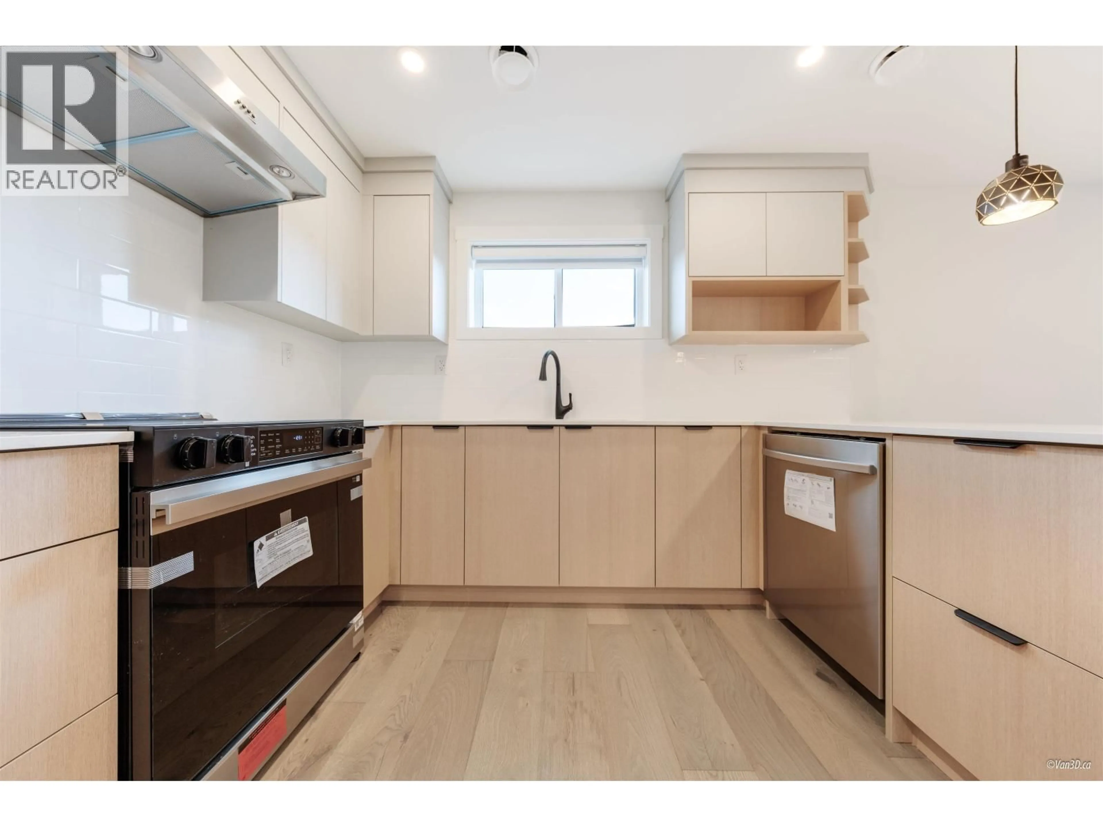 Standard kitchen, wood/laminate floor for 202 - 5092 SLOCAN STREET, Vancouver British Columbia V5R2A5