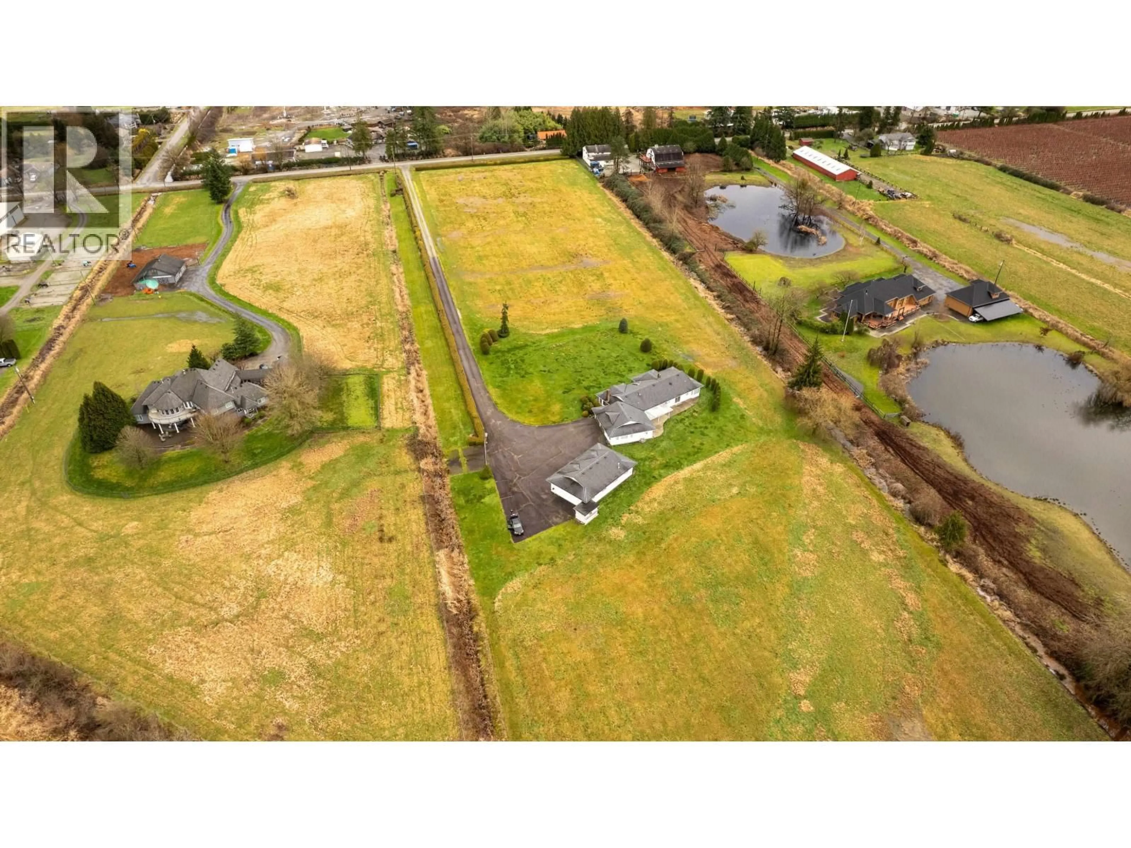 A pic from outside/outdoor area/front of a property/back of a property/a pic from drone, street for 15145 HARRIS ROAD, Pitt Meadows British Columbia V3Y1Z1