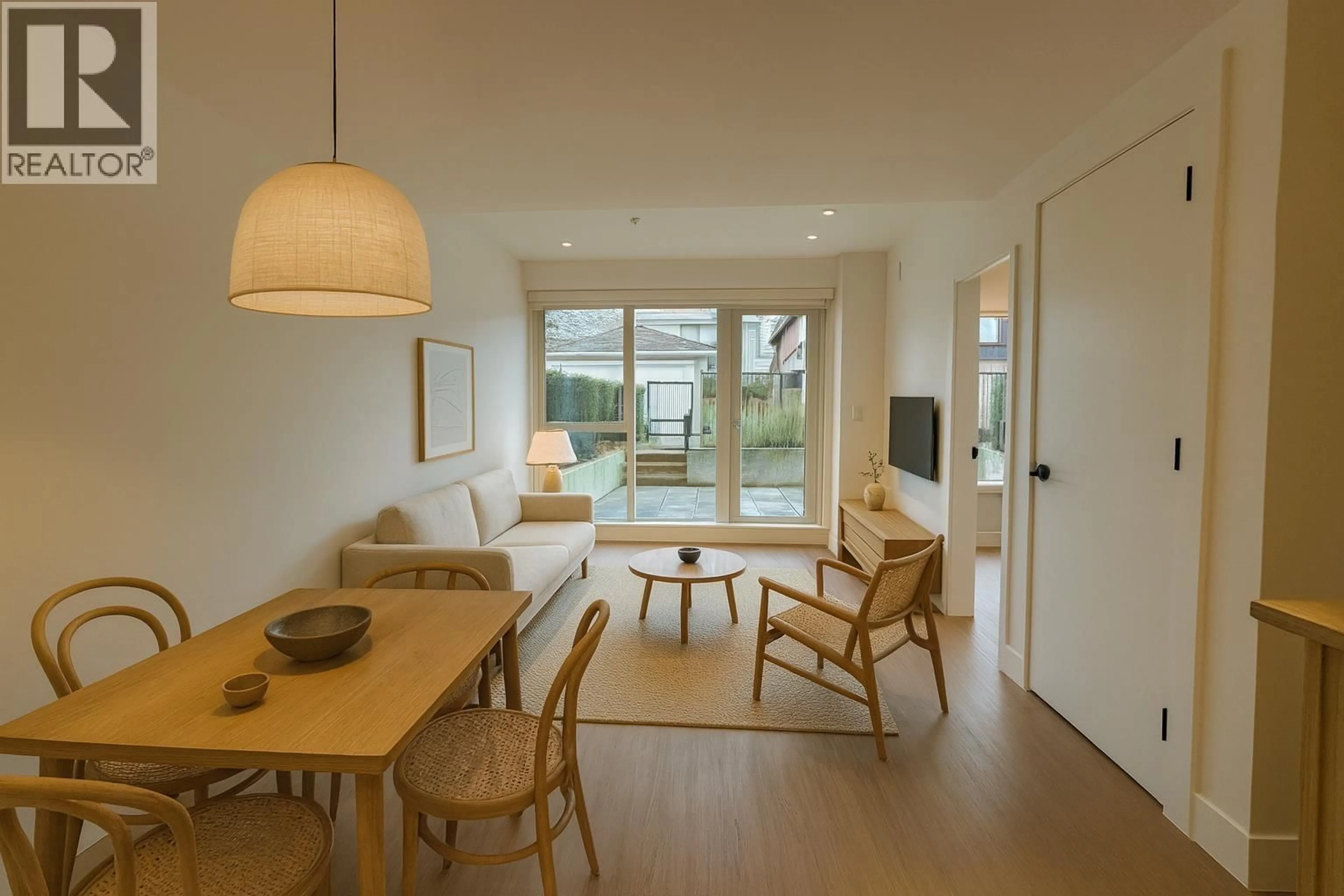 Living room with furniture, wood/laminate floor for 110 - 2235 BROADWAY, Vancouver British Columbia V5N0J5