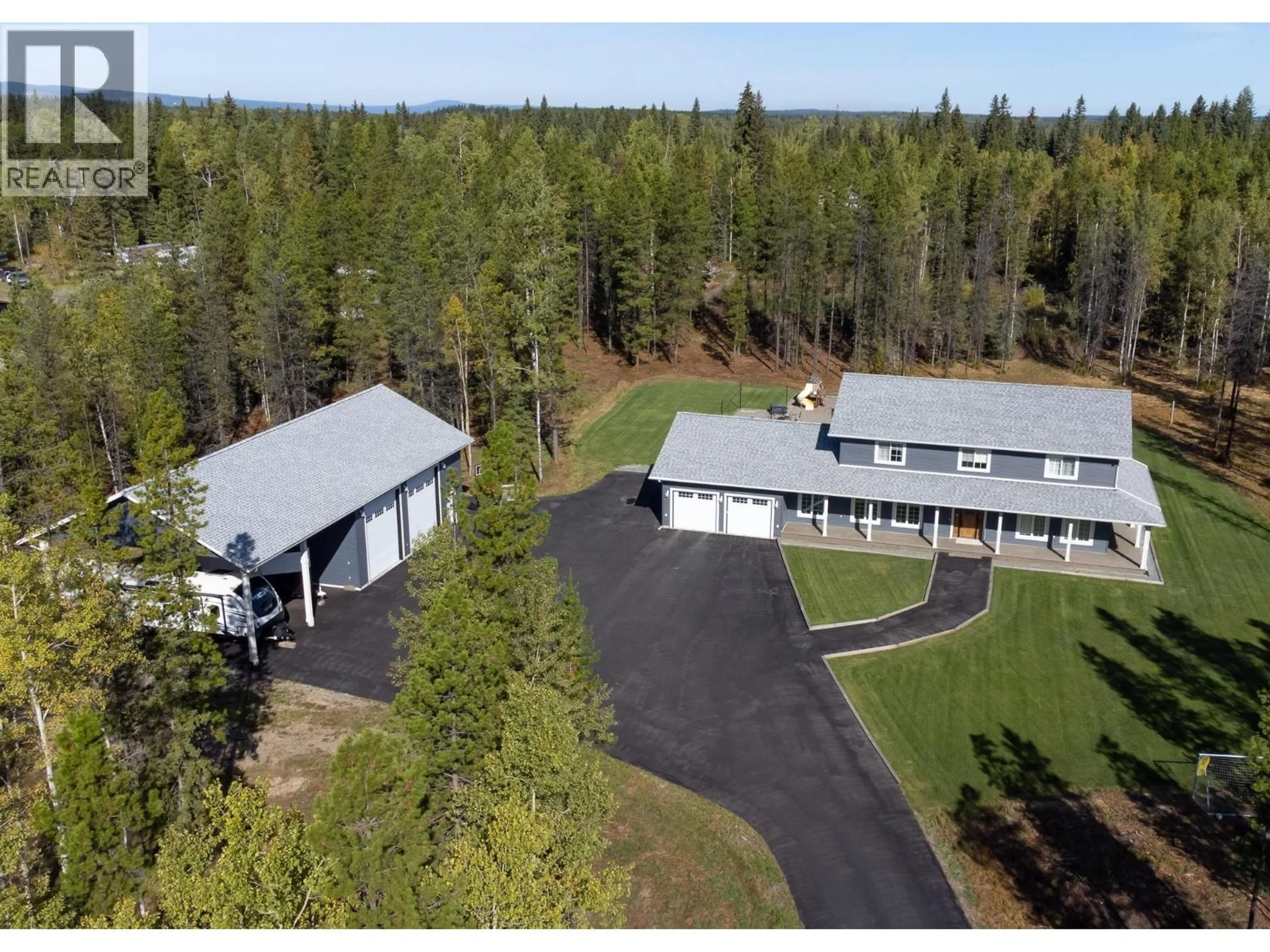 A pic from outside/outdoor area/front of a property/back of a property/a pic from drone, unknown for 3820 REEVES DRIVE, Prince George British Columbia V2N5Y2