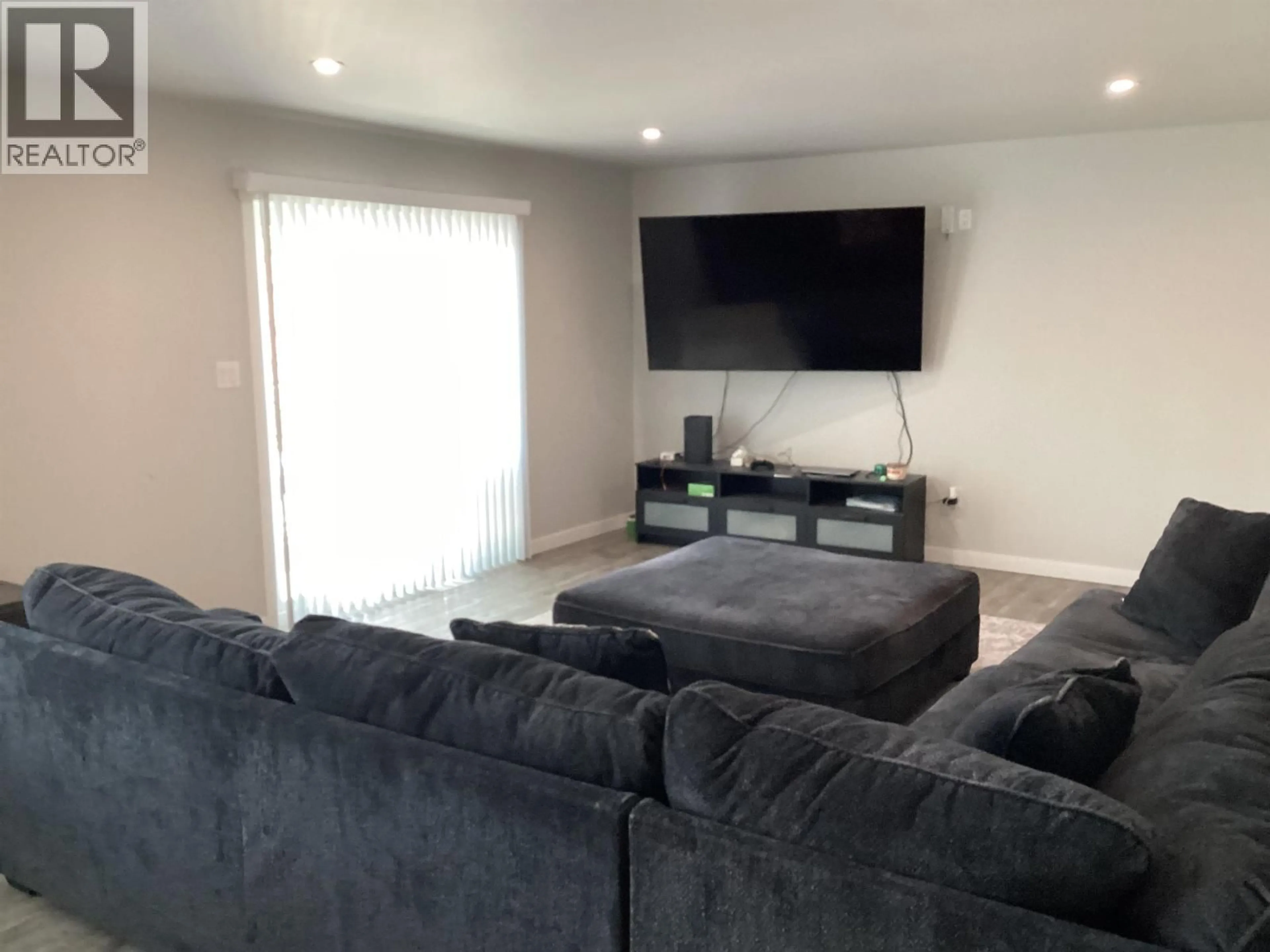 Living room with furniture, unknown for 7021 KENNEDY CRESCENT, Prince George British Columbia V2K2P9