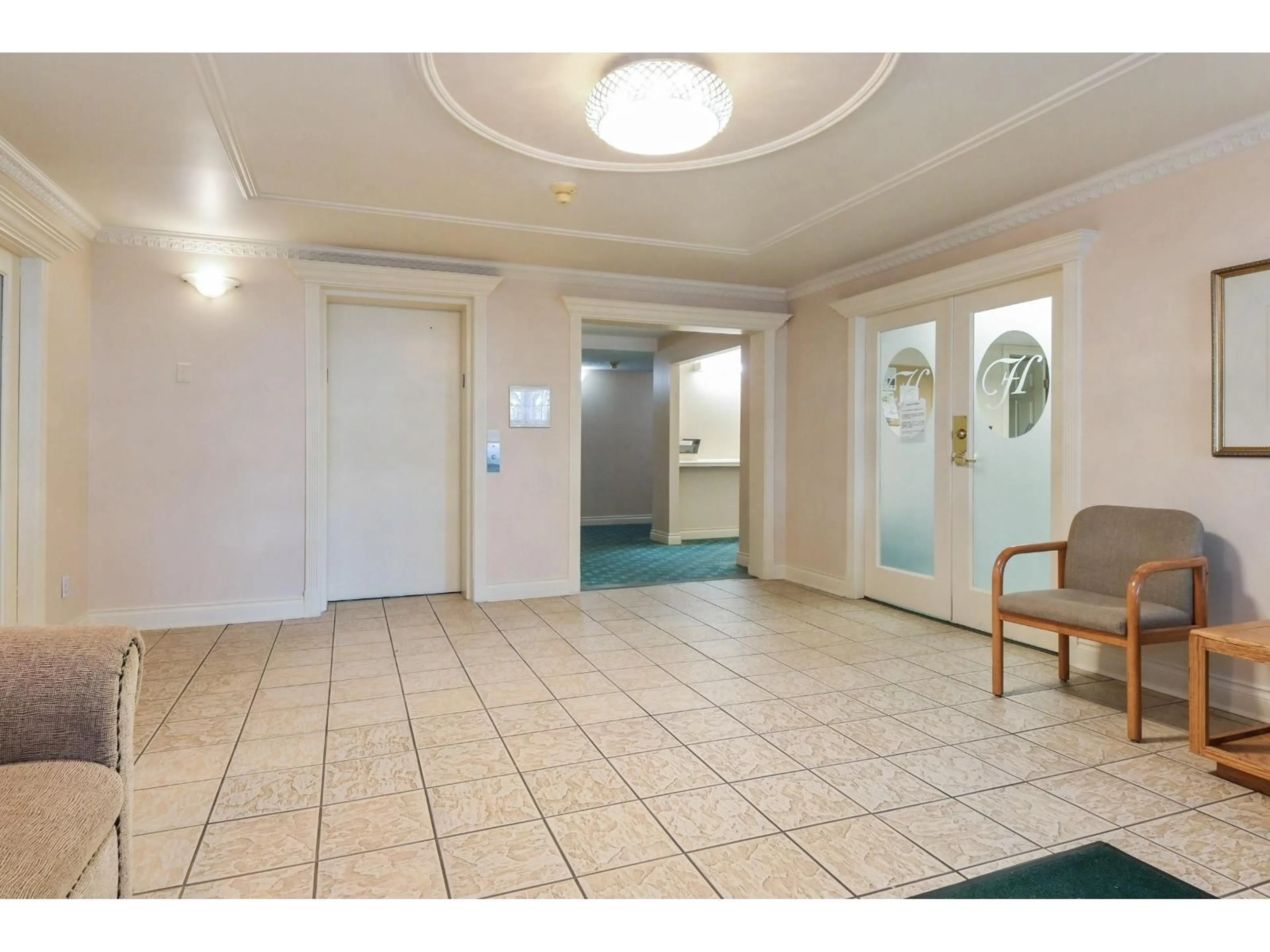 Indoor foyer for 107 - 16065 83 AVENUE, Surrey British Columbia V4N0N2