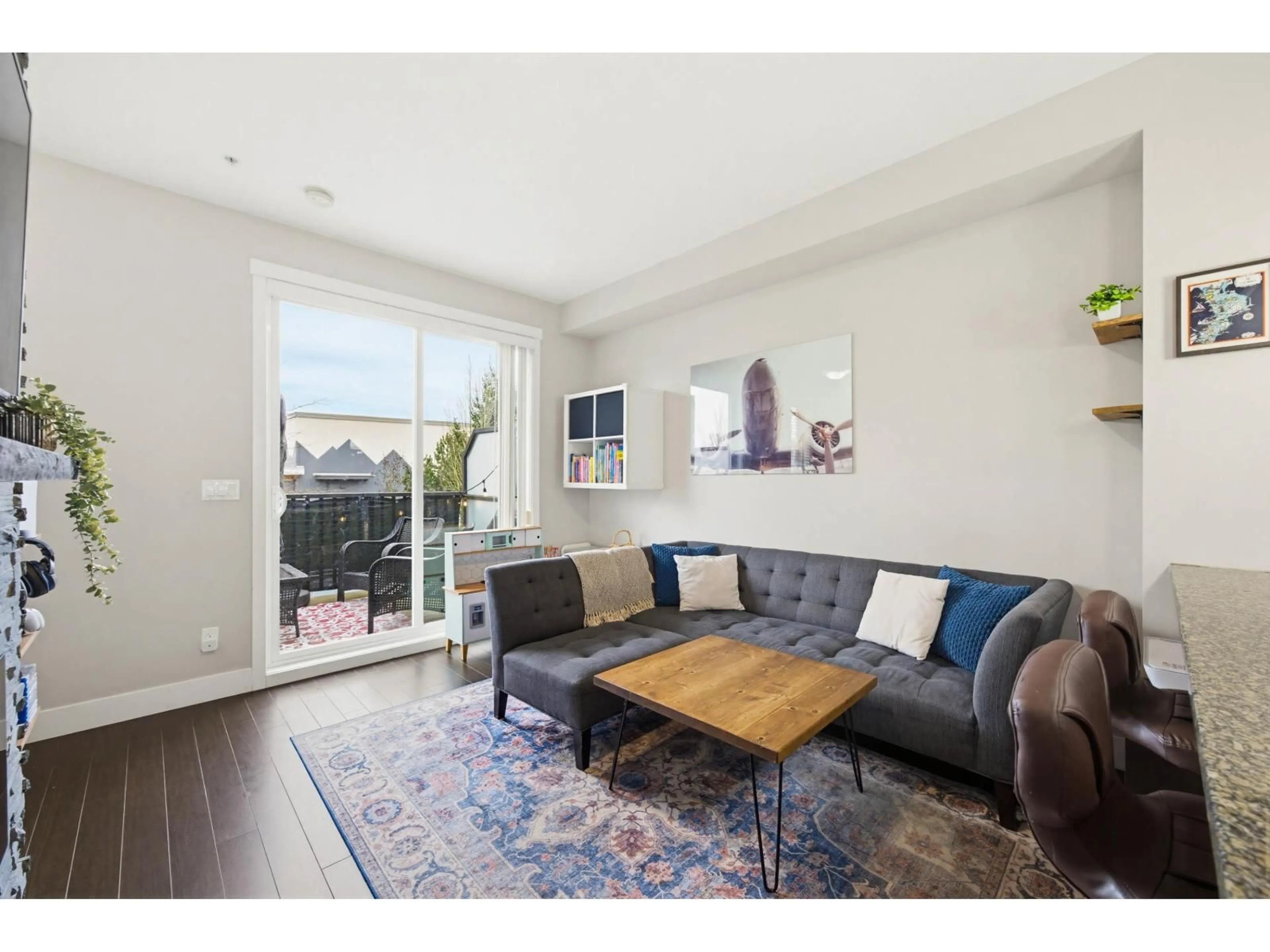 Living room with furniture, wood/laminate floor for 11 - 8250 209B STREET, Langley British Columbia V2Y0J7