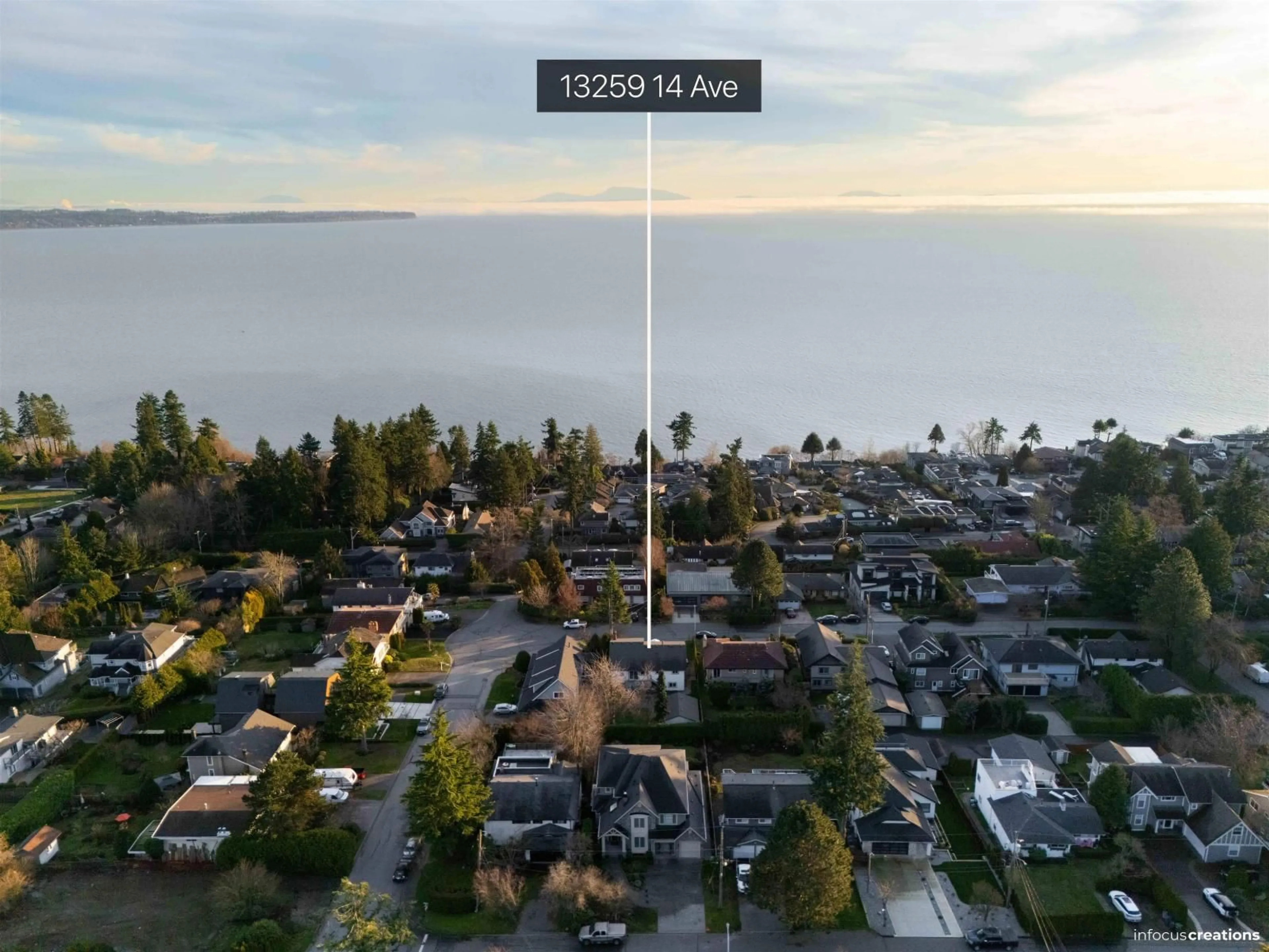 A pic from outside/outdoor area/front of a property/back of a property/a pic from drone, water/lake/river/ocean view for 13259 14 AVENUE, Surrey British Columbia V4A1G7