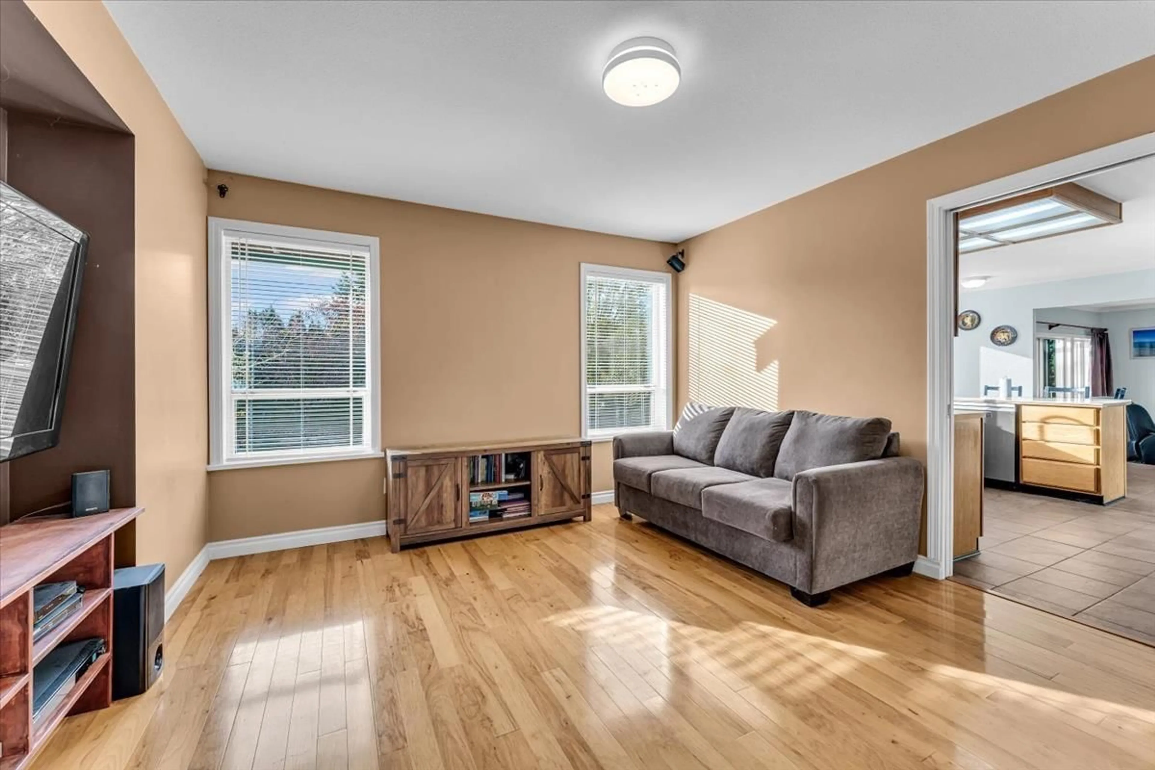 Living room with furniture, wood/laminate floor for 14906 83A AVENUE, Surrey British Columbia V3S7S1