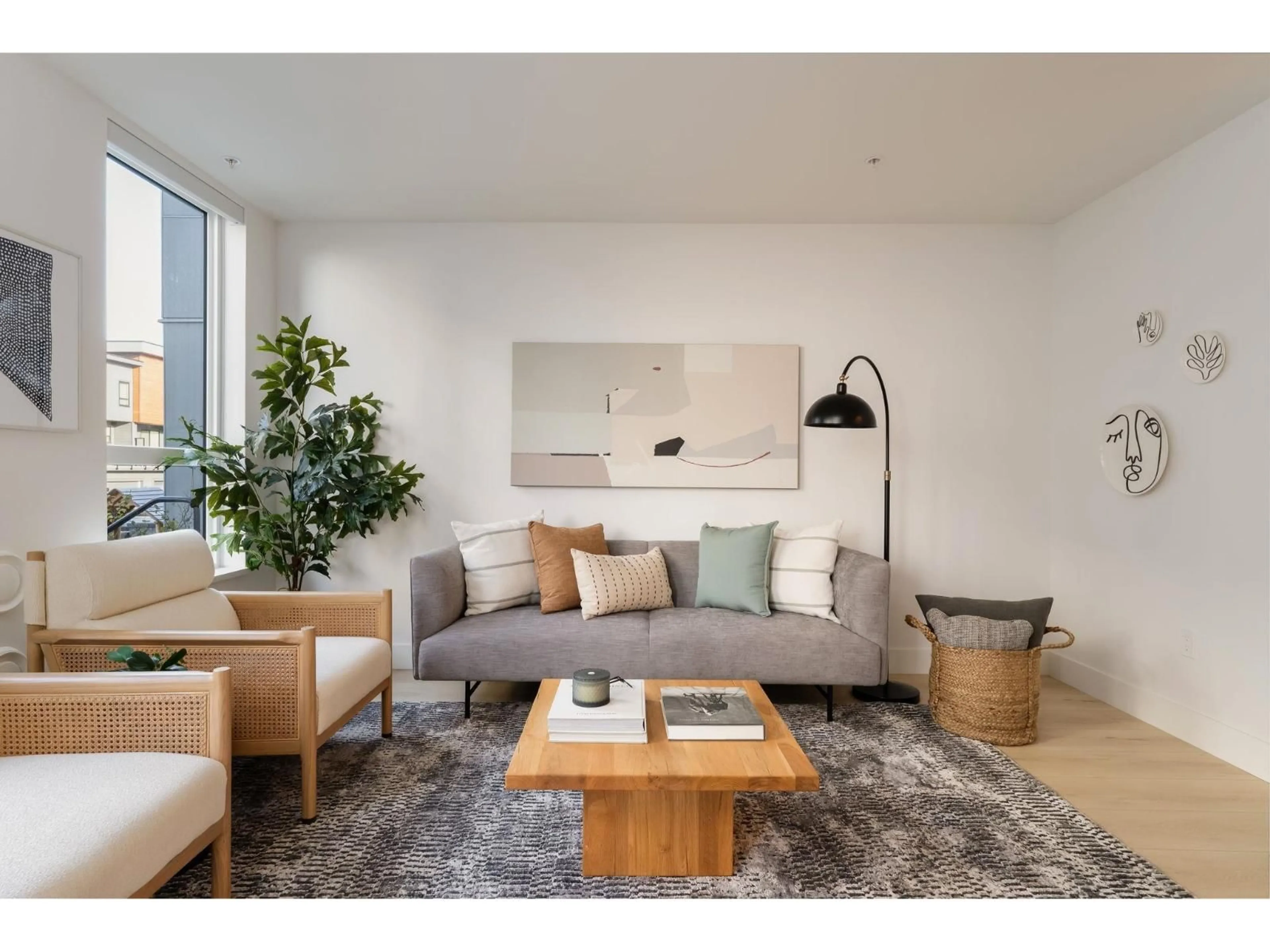 Living room with furniture, wood/laminate floor for 401 - 30494 CARDINAL AVENUE, Abbotsford British Columbia V2T0A5