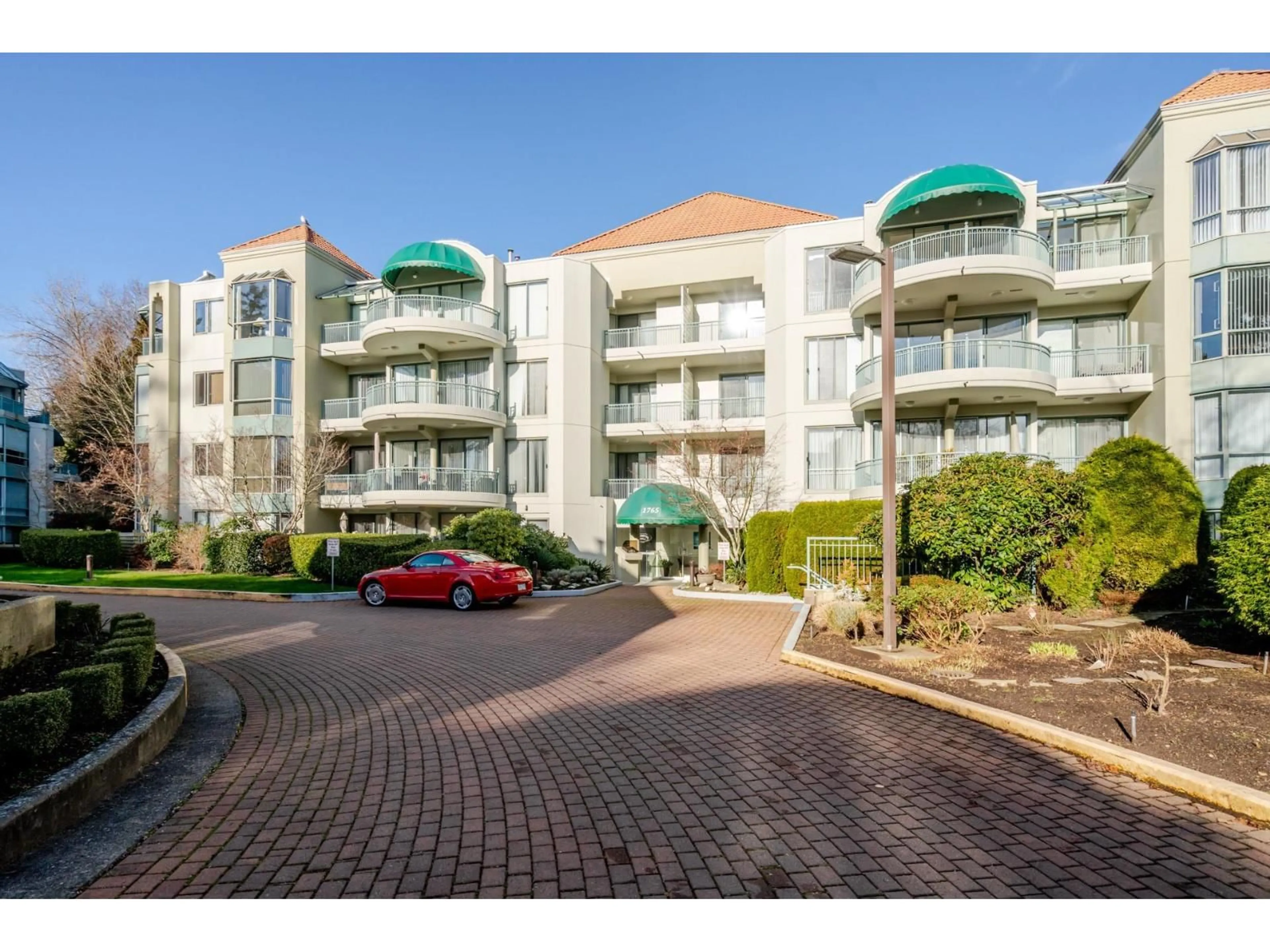 A pic from outside/outdoor area/front of a property/back of a property/a pic from drone, street for 408 - 1765 MARTIN DRIVE, Surrey British Columbia V4A9T5