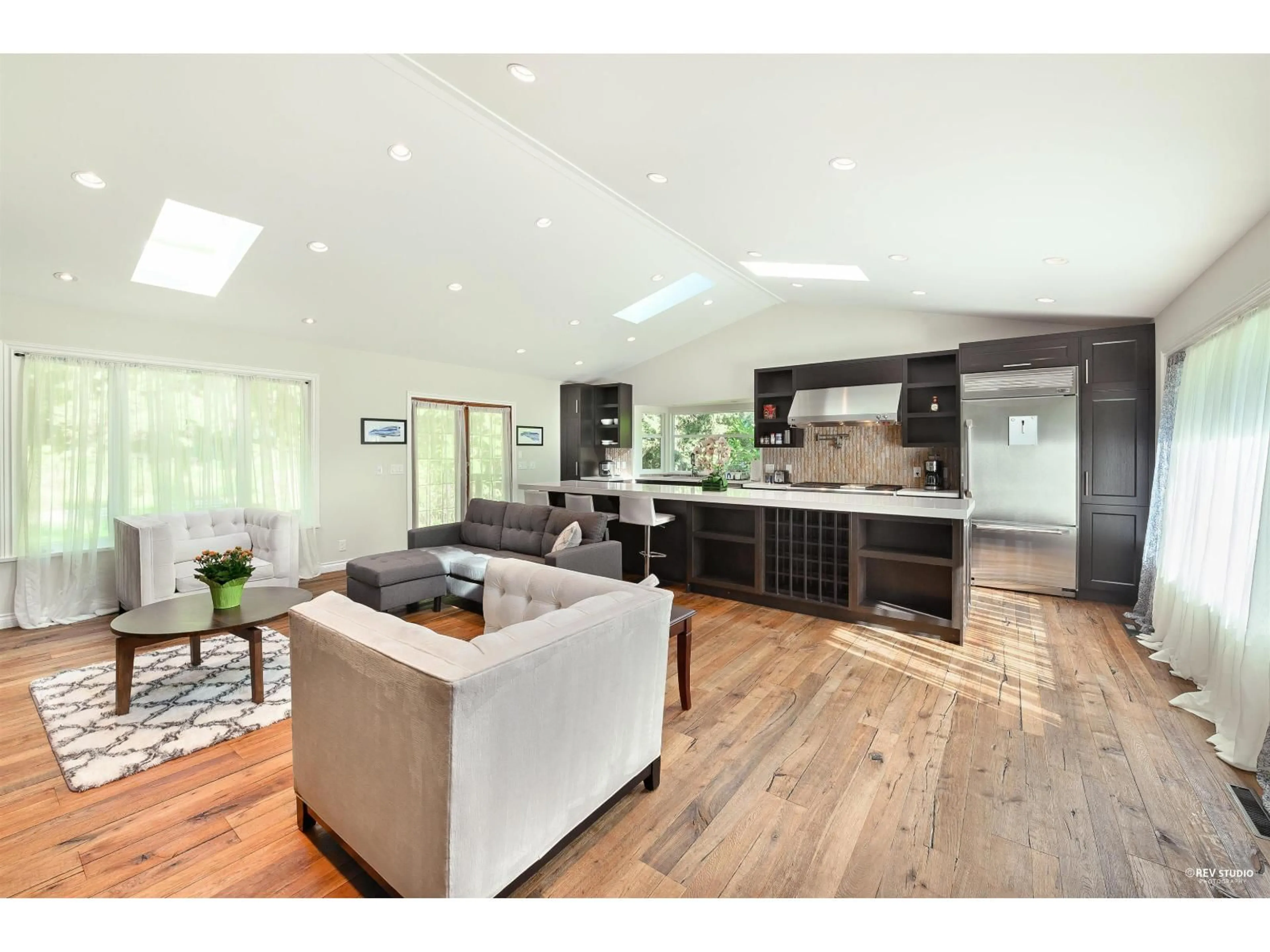 Open concept kitchen, wood/laminate floor for 13671 16 AVENUE, Surrey British Columbia V4A1P7