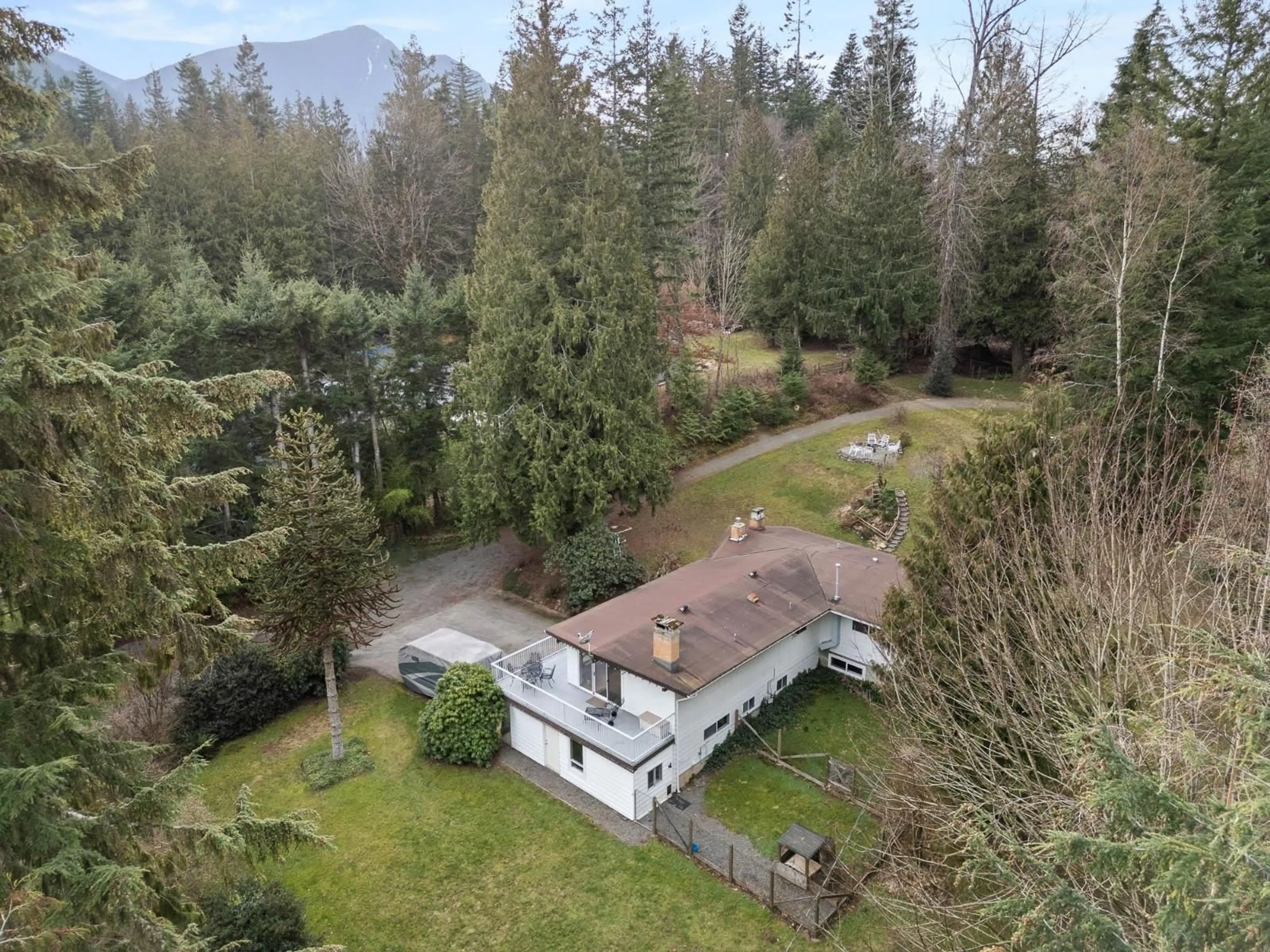 A pic from outside/outdoor area/front of a property/back of a property/a pic from drone, mountain view for 4895 SOUTHSIDE ROAD, Chilliwack British Columbia V2R4T6