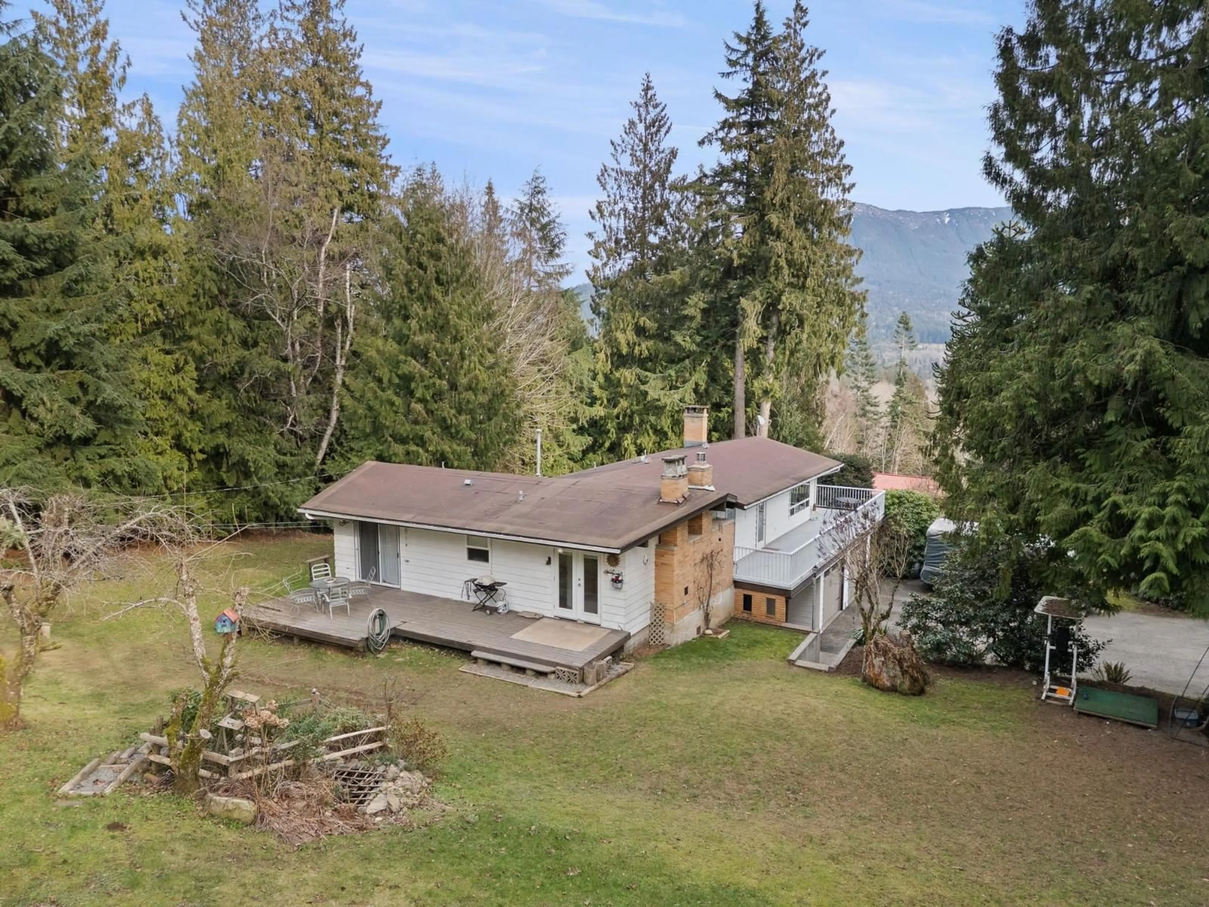 A pic from outside/outdoor area/front of a property/back of a property/a pic from drone, mountain view for 4895 SOUTHSIDE ROAD, Chilliwack British Columbia V2R4T6