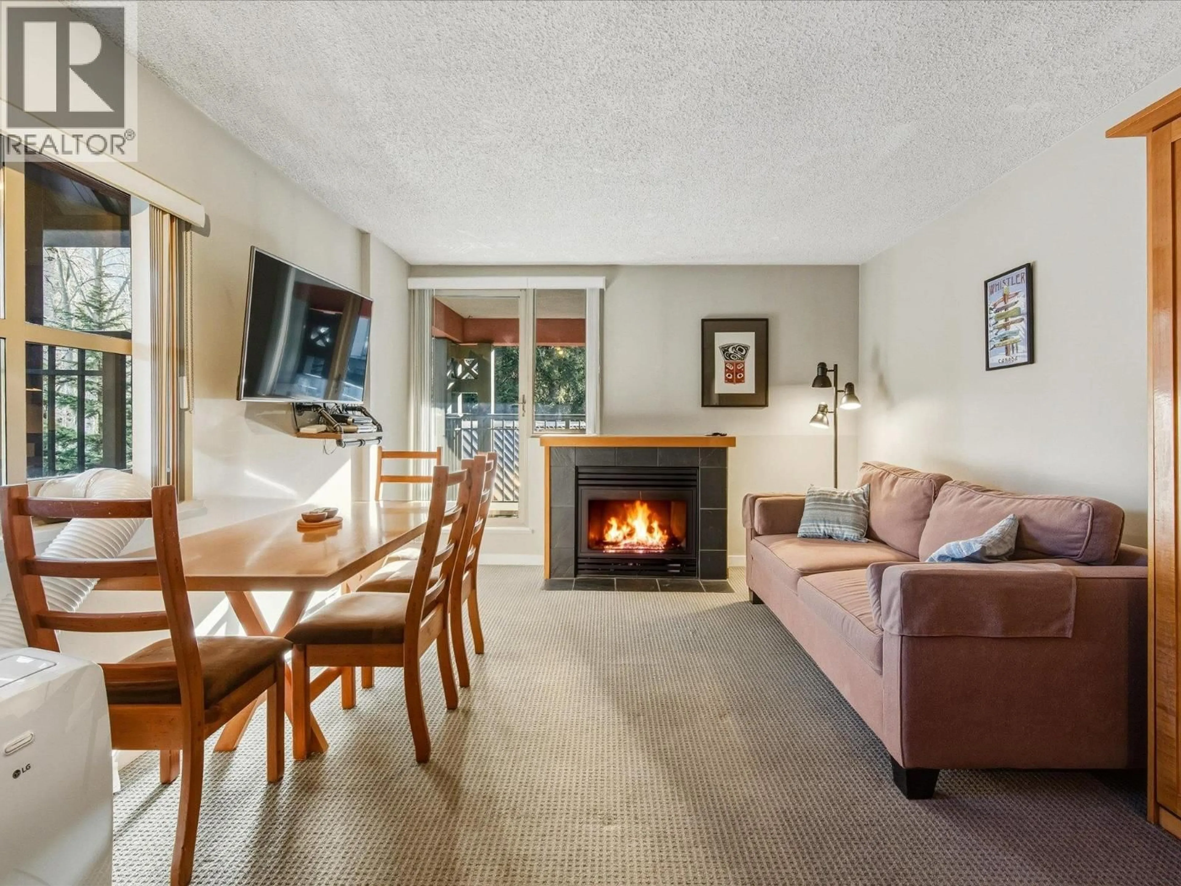 Living room with furniture, unknown for 3308 - 4295 BLACKCOMB WAY, Whistler British Columbia V8E0X2