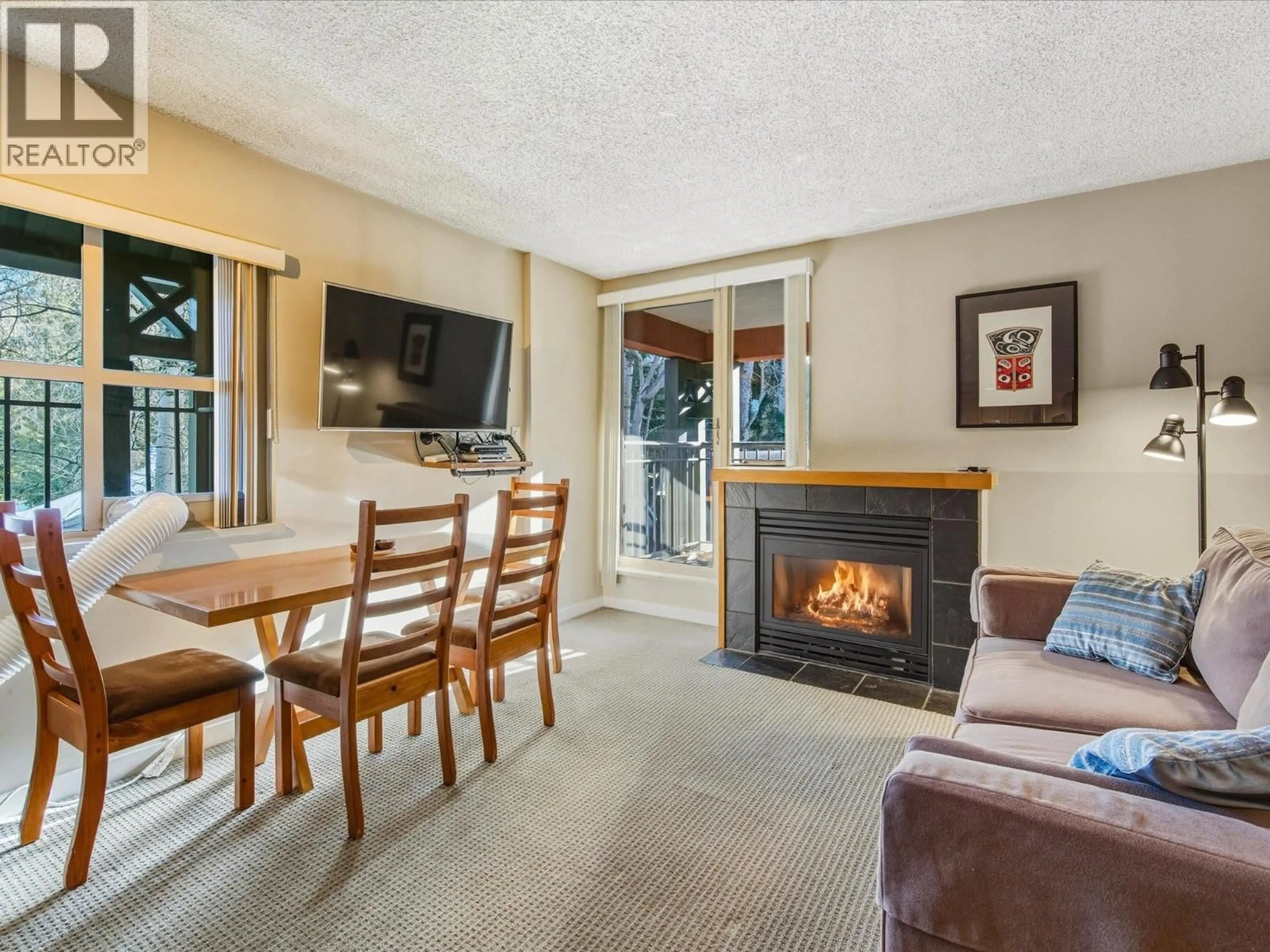 Living room with furniture, unknown for 3308 - 4295 BLACKCOMB WAY, Whistler British Columbia V8E0X2
