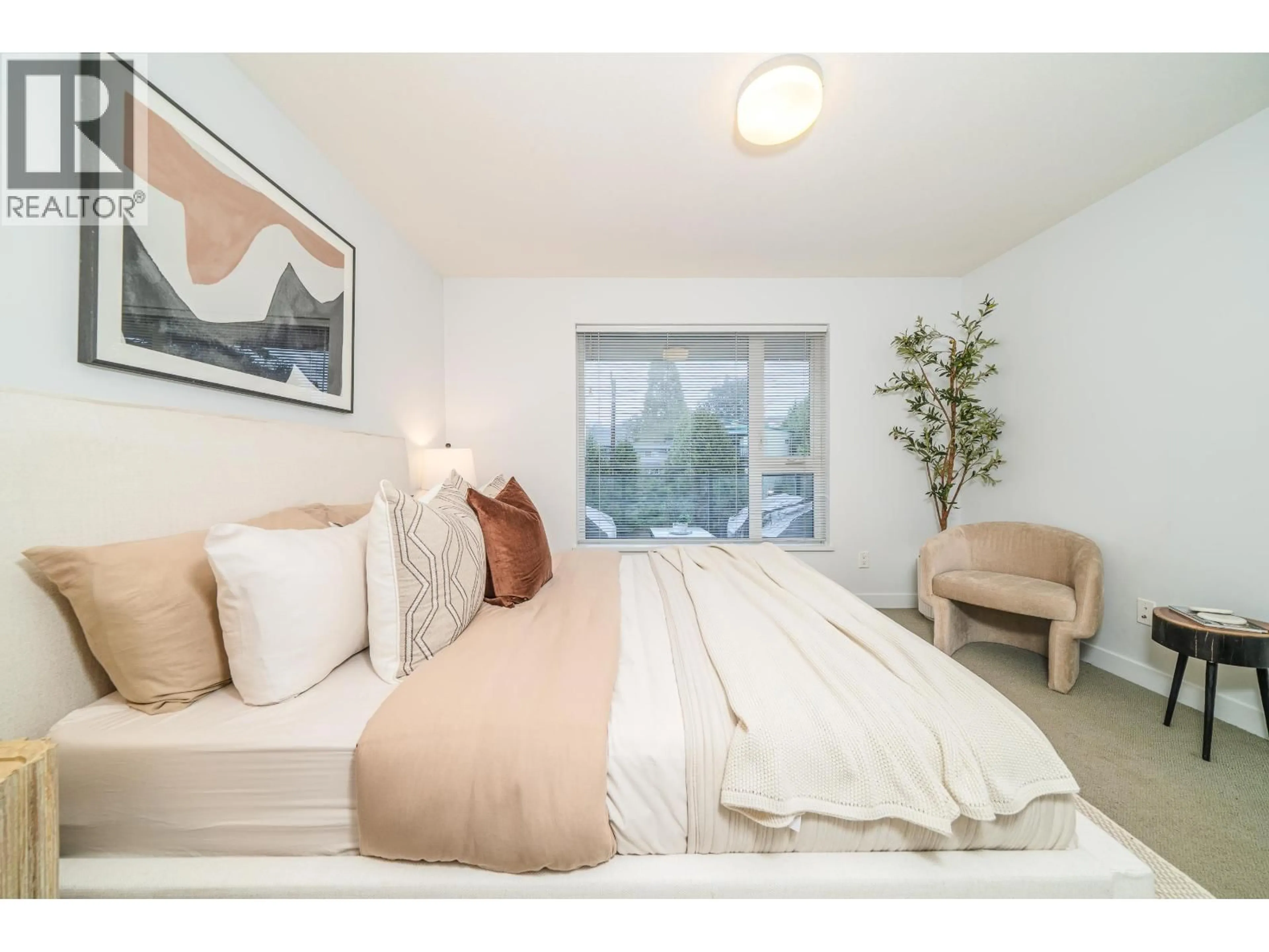Bedroom with bed, wood/laminate floor for 416 - 221 3RD STREET, North Vancouver British Columbia V7L0C1