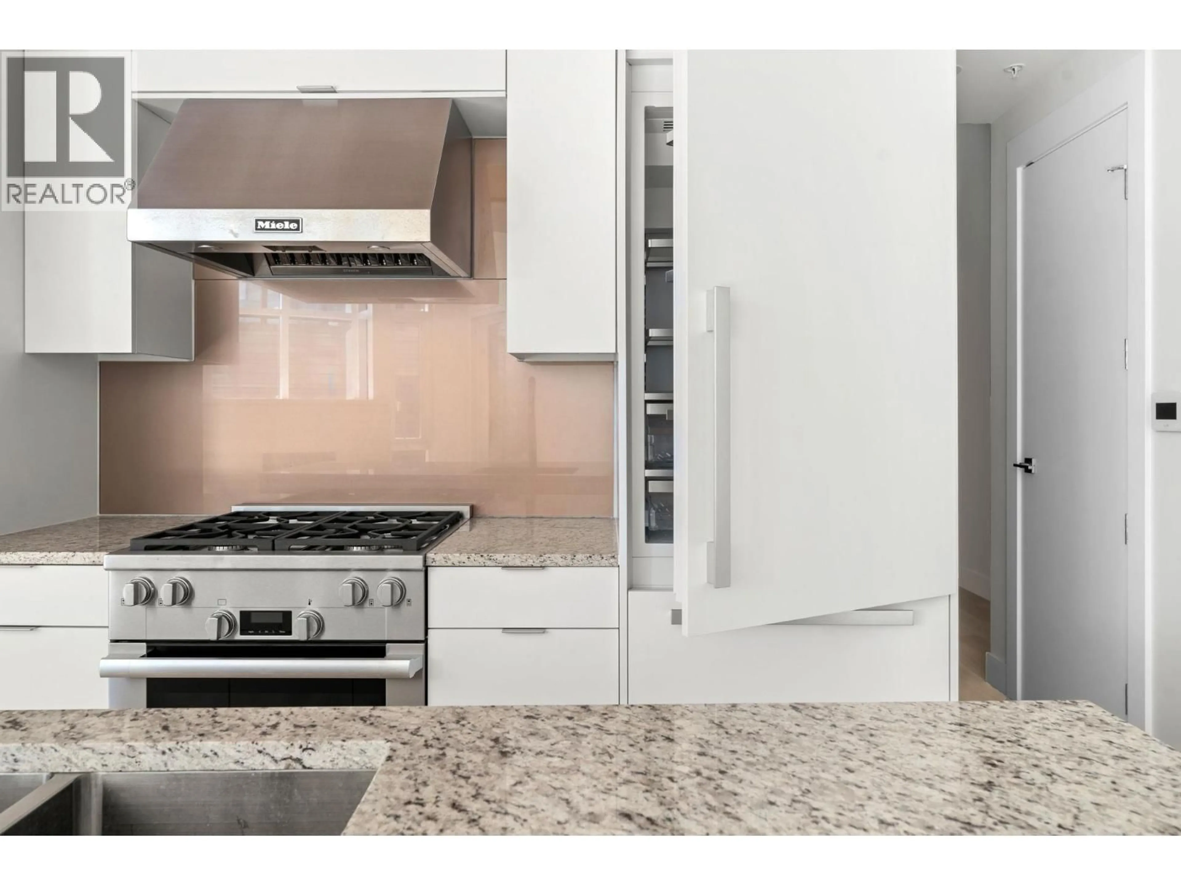 Contemporary kitchen, ceramic/tile floor for 404 - 6699 NELSON AVENUE, West Vancouver British Columbia V7W2B2