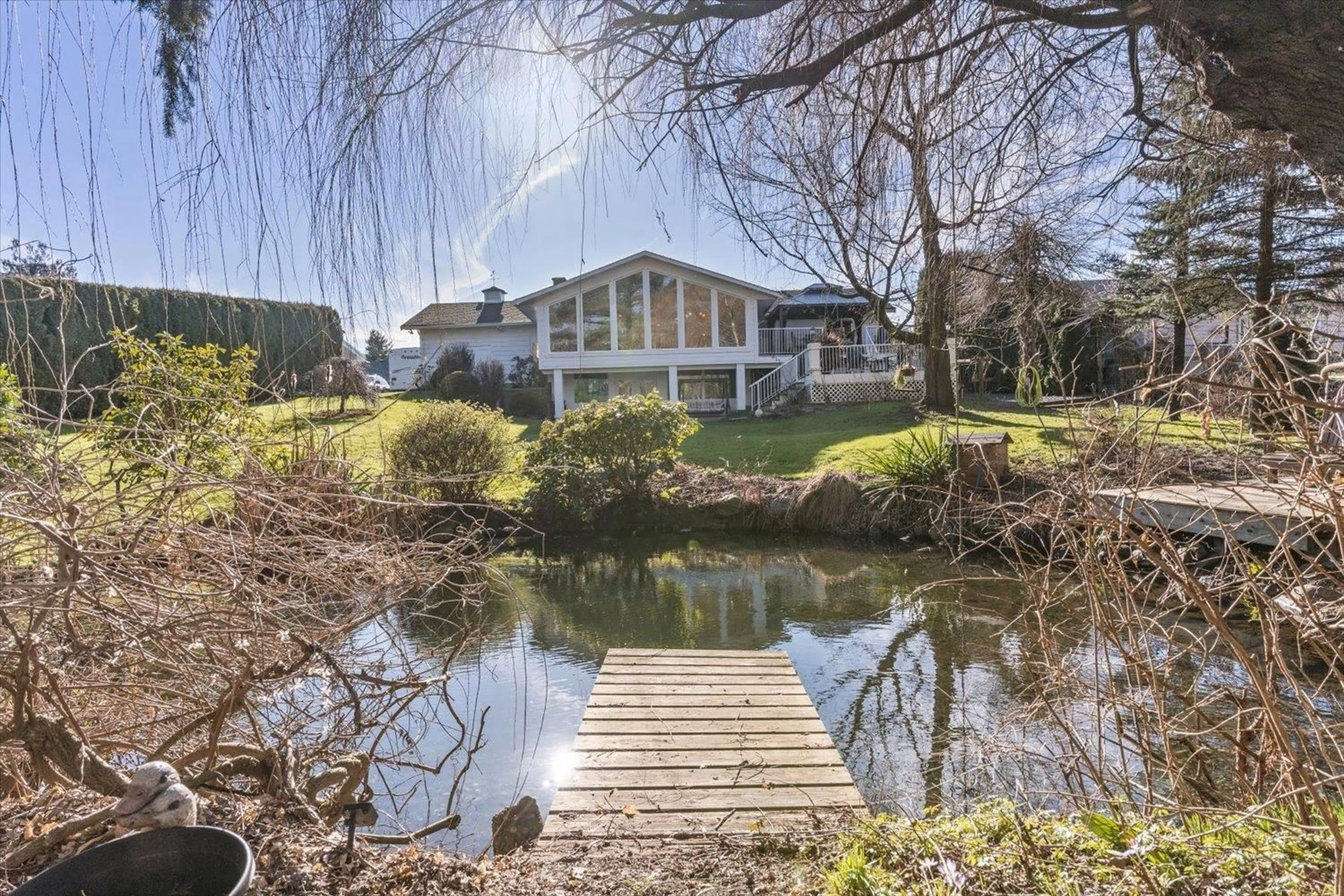 A pic from outside/outdoor area/front of a property/back of a property/a pic from drone, water/lake/river/ocean view for 45431 WELLS ROAD, Chilliwack British Columbia V2R1H3