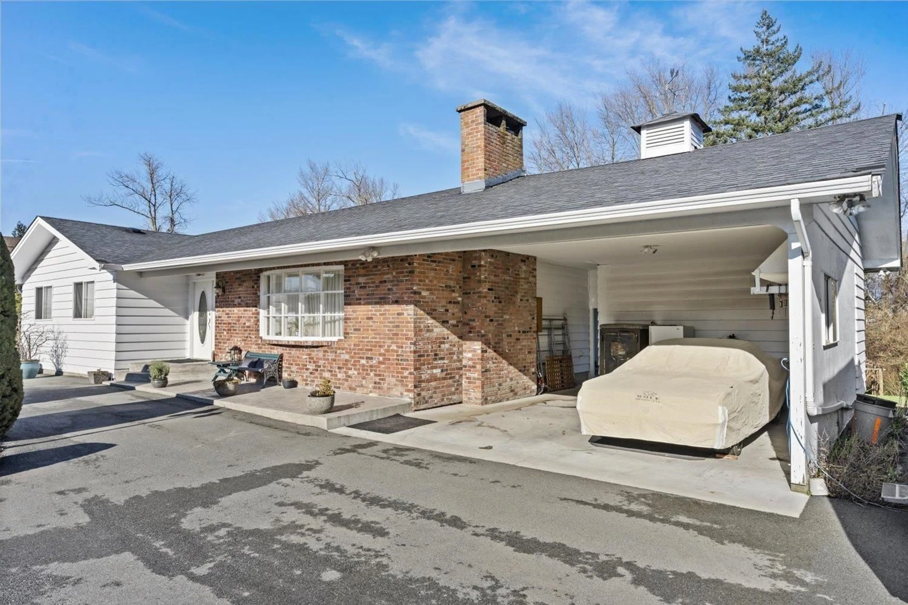 Home with brick exterior material, street for 45431 WELLS ROAD, Chilliwack British Columbia V2R1H3
