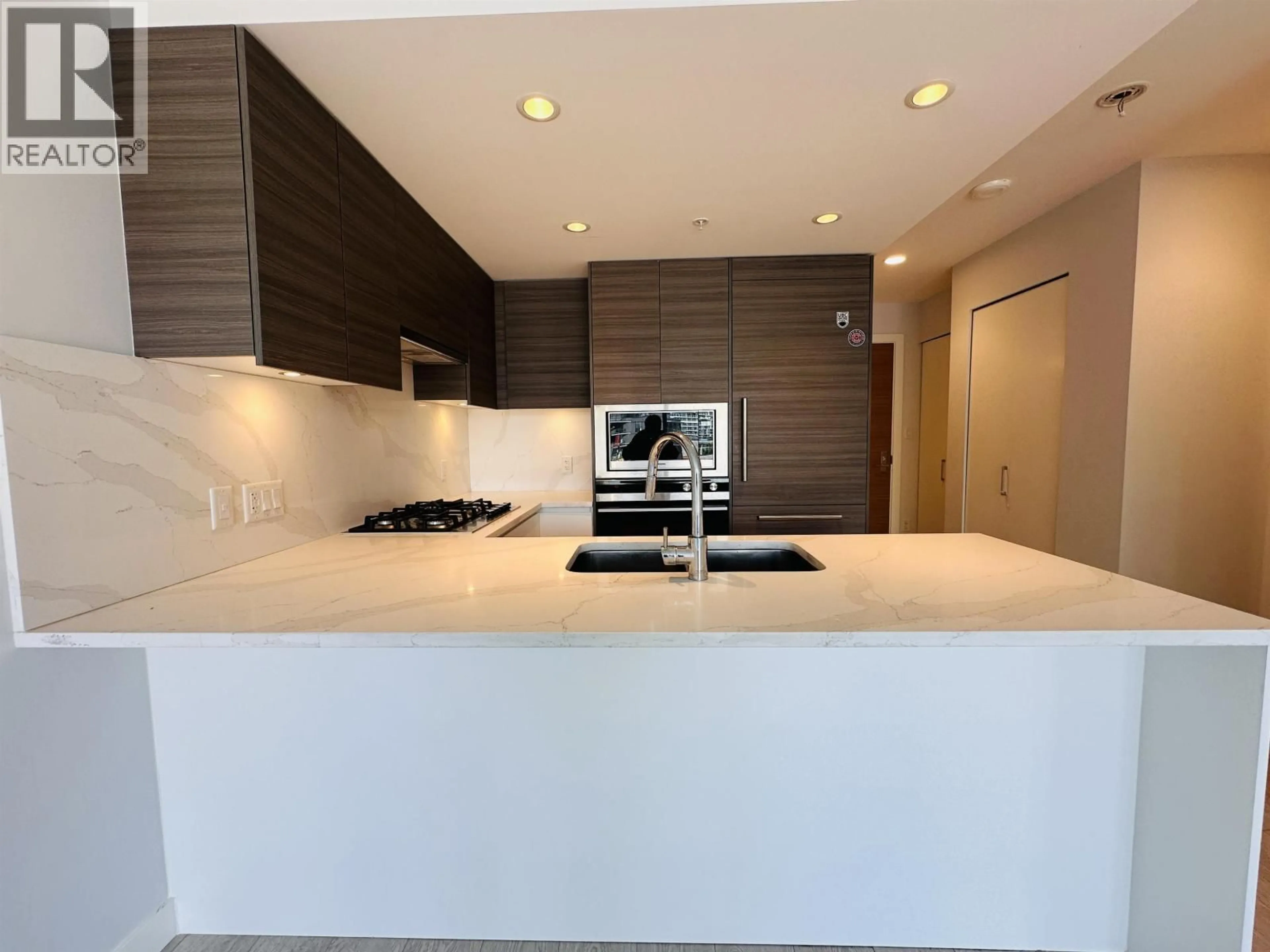Open concept kitchen, ceramic/tile floor for 607 - 6833 BUSWELL STREET, Richmond British Columbia V6Y0L3