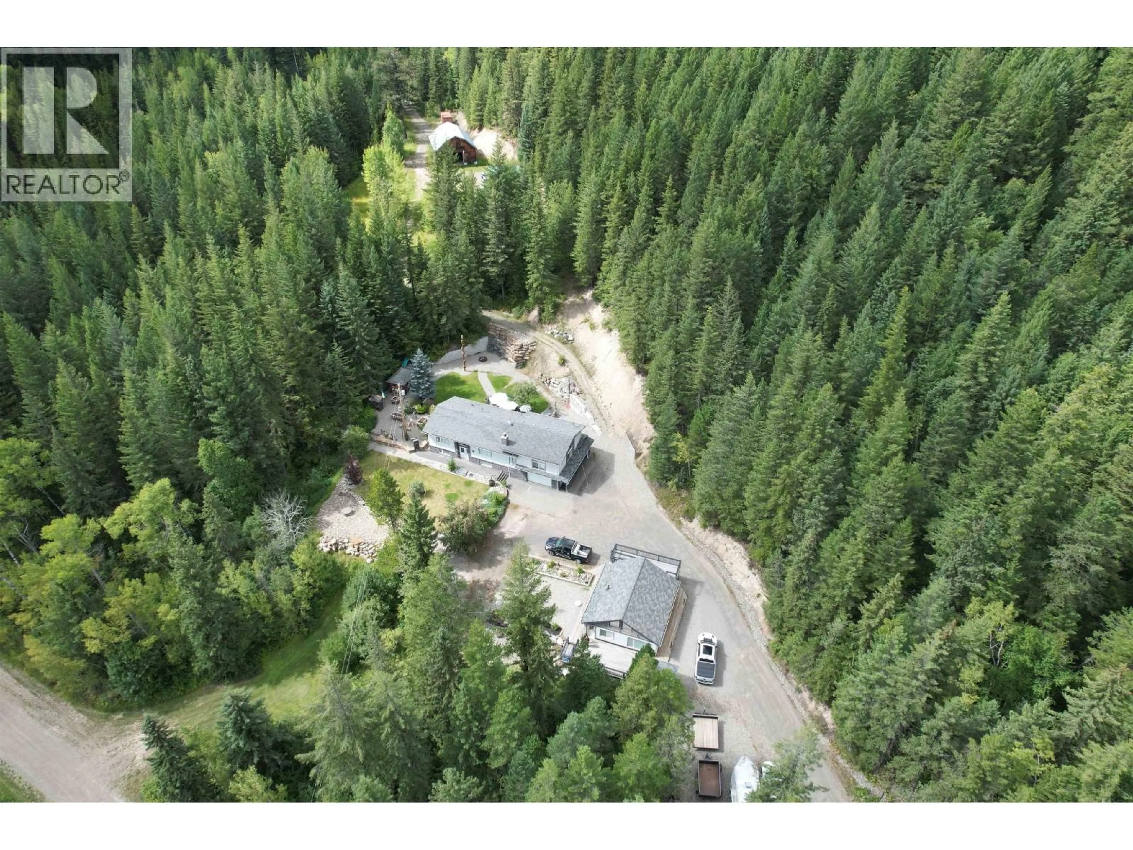 A pic from outside/outdoor area/front of a property/back of a property/a pic from drone, forest/trees view for 4487 DICK ROAD, Quesnel British Columbia V2J6W9