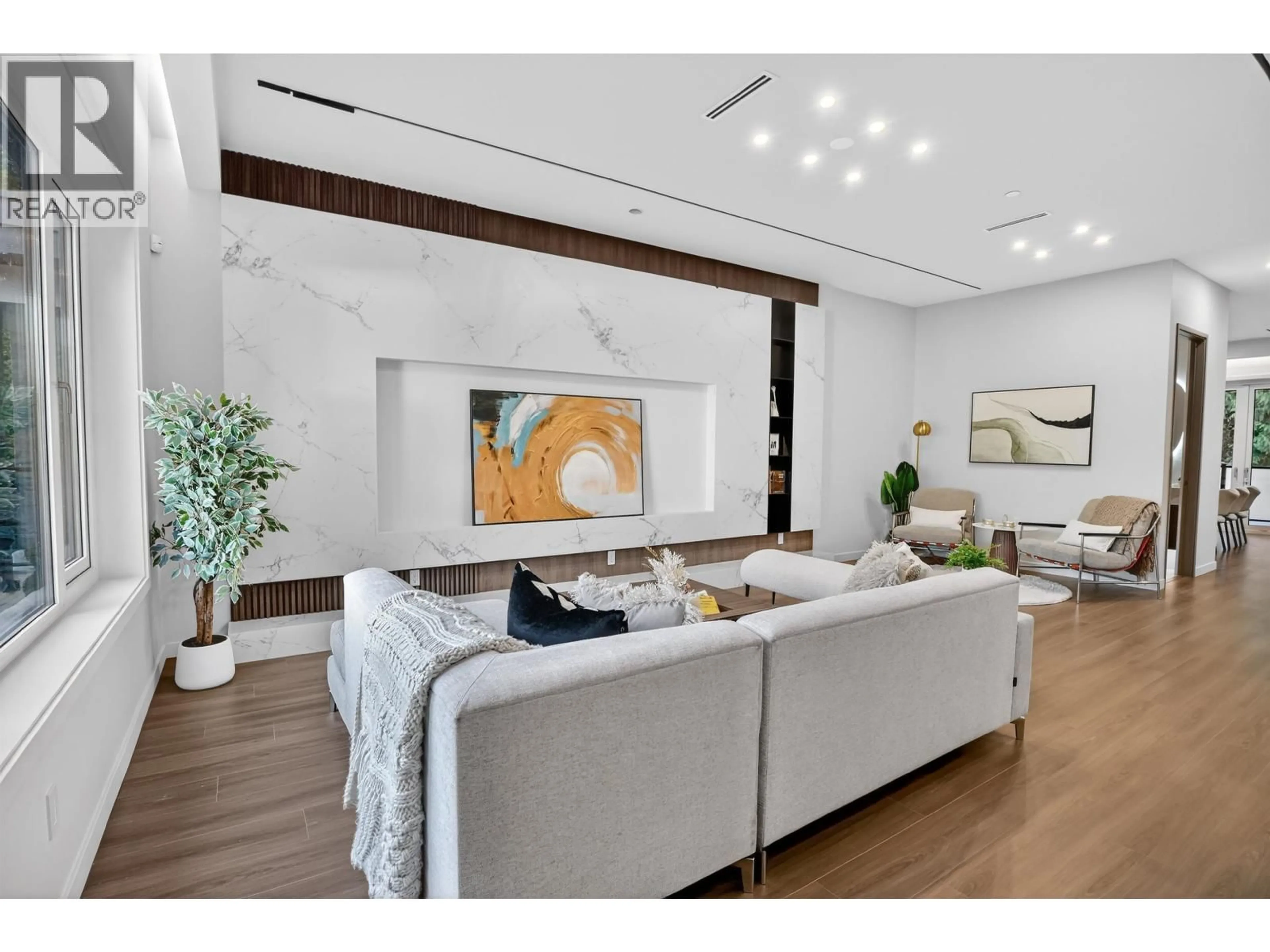 Living room with furniture, wood/laminate floor for 3548 35TH AVENUE, Vancouver British Columbia V6N2N5