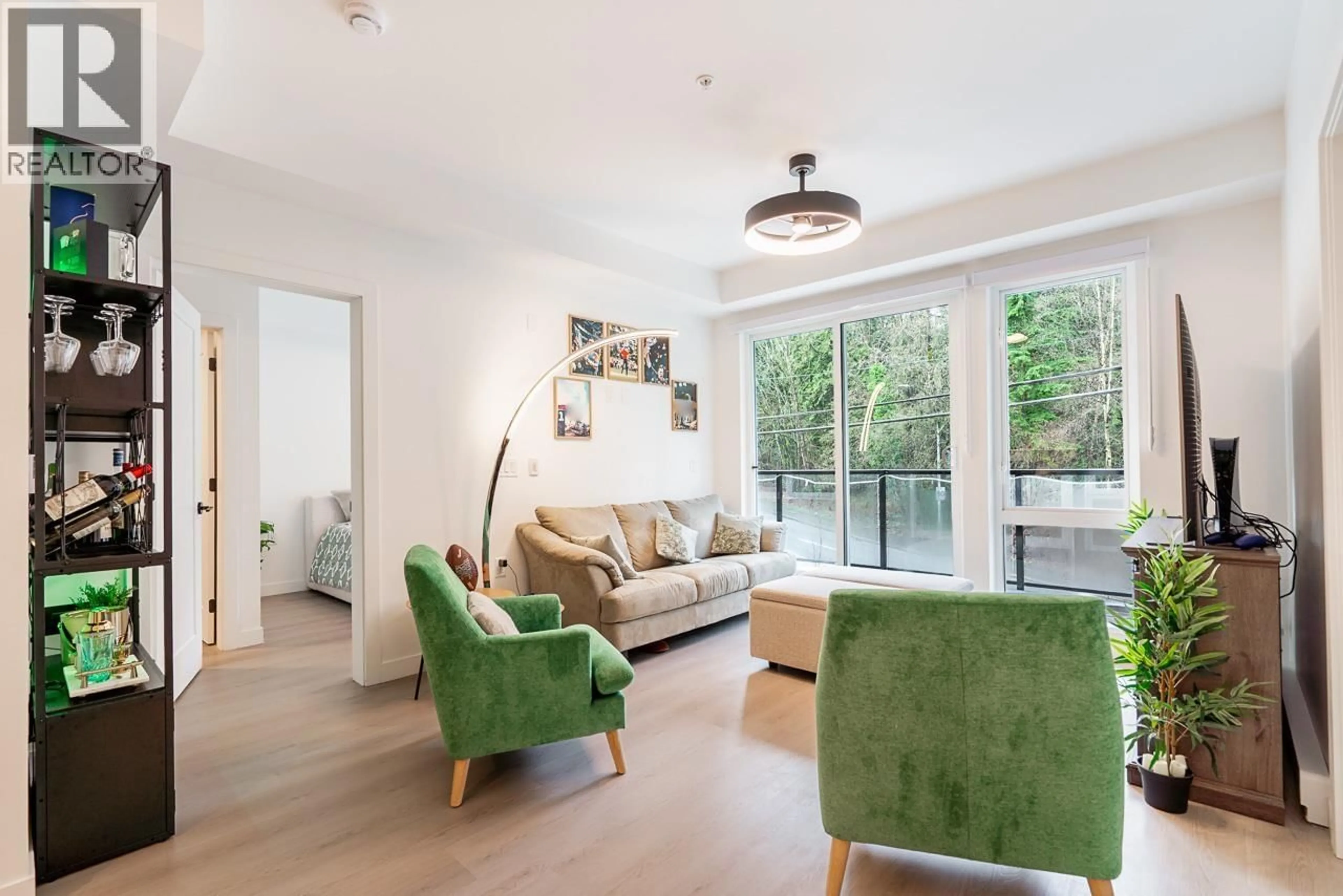 Living room with furniture, wood/laminate floor for 219 - 2002 ST. GEORGE STREET, Port Moody British Columbia V3H0N4