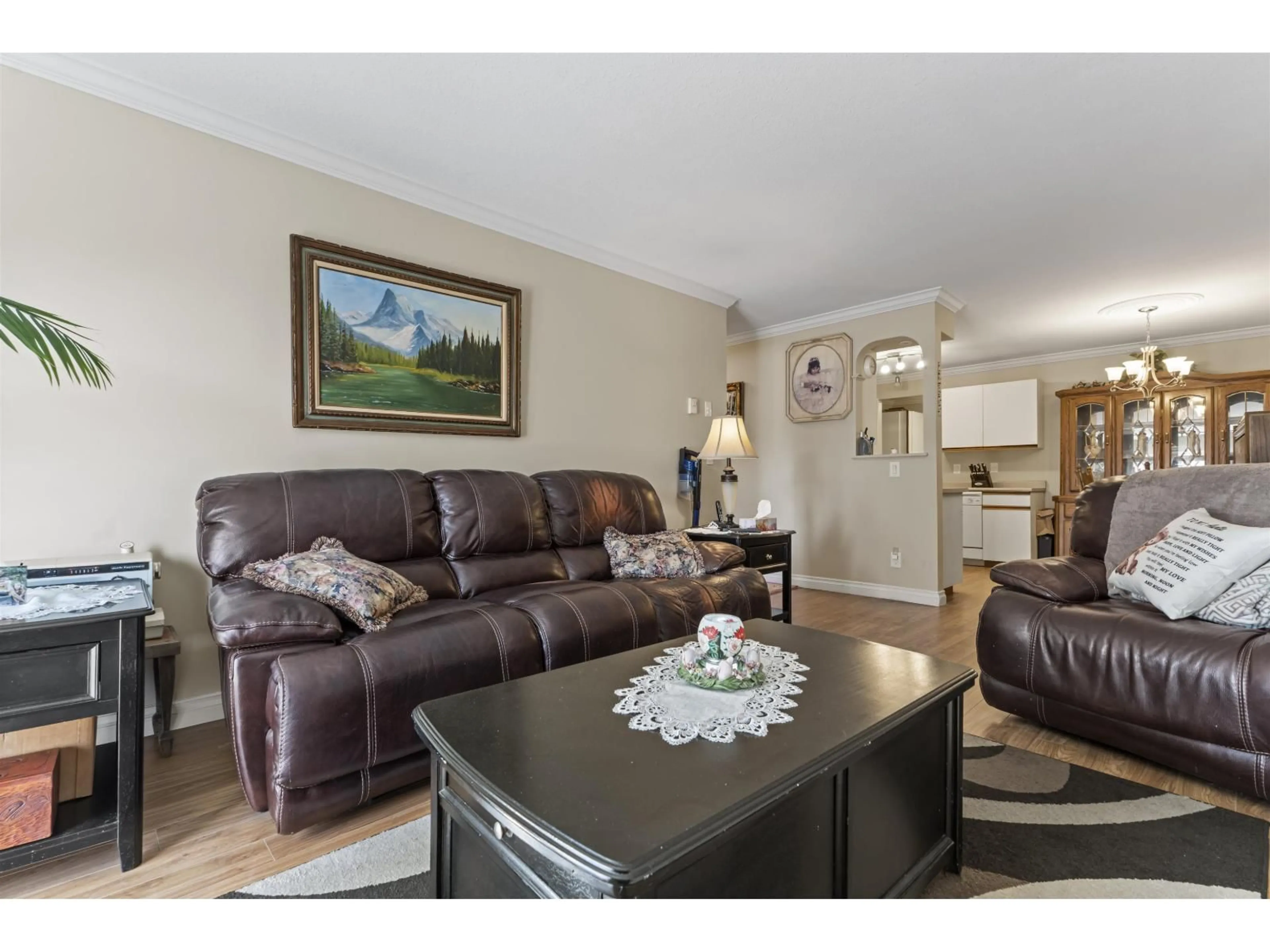Living room with furniture, wood/laminate floor for 105 - 8934 MARY STREET, Chilliwack British Columbia V2P4J3
