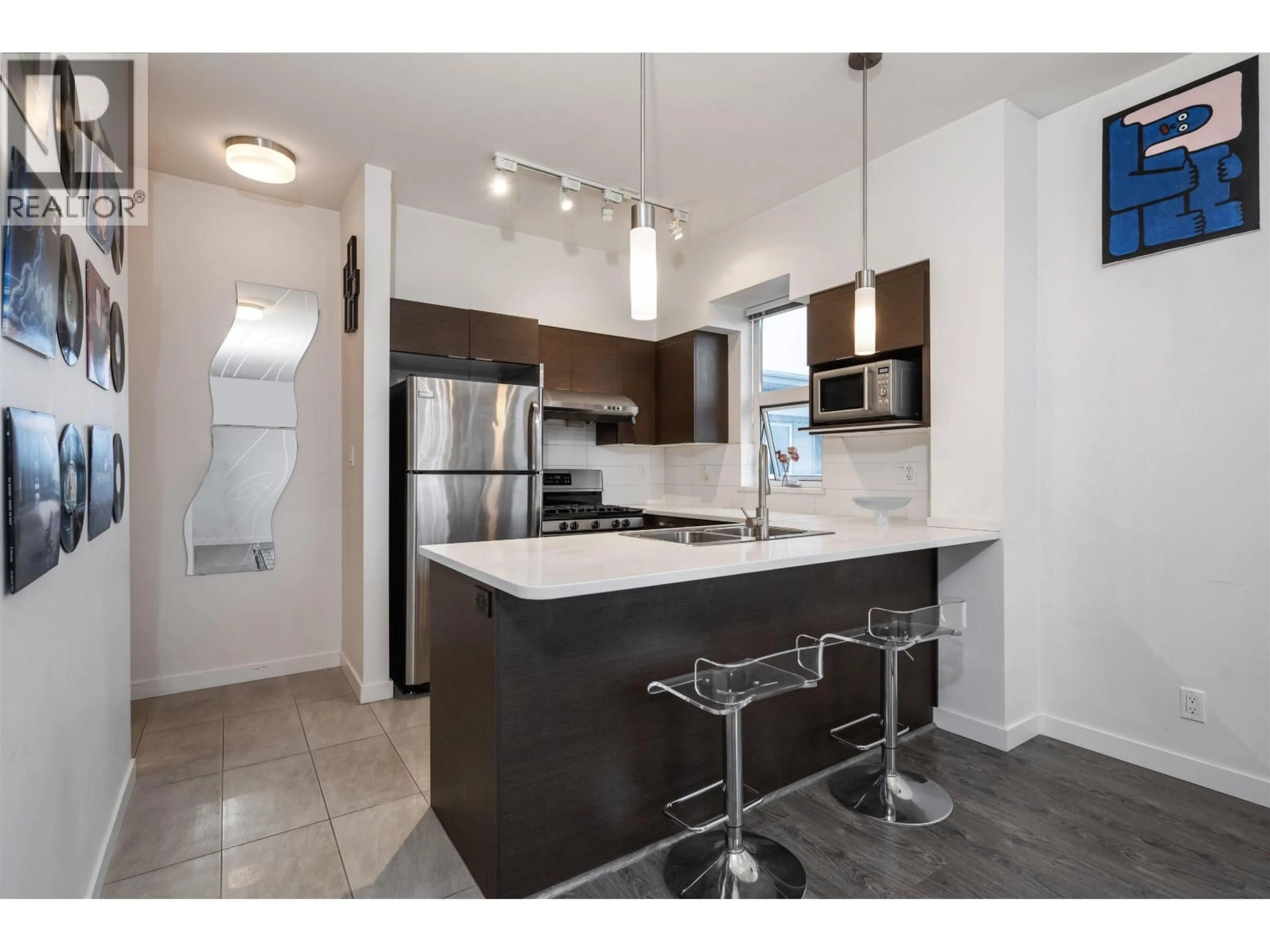 Open concept kitchen, unknown for 426 - 10880 NO. 5 ROAD, Richmond British Columbia V6W0B3