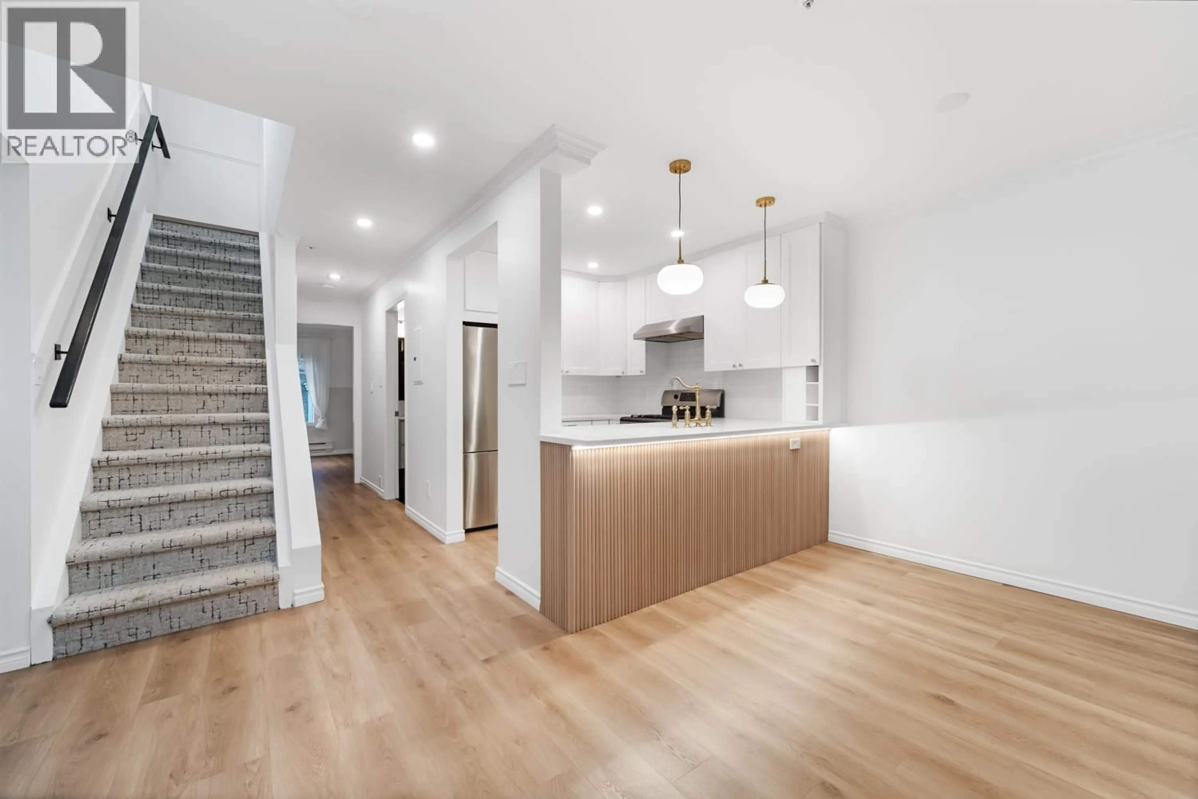 Open concept kitchen, wood/laminate floor for 1407 PENDRELL STREET, Vancouver British Columbia V6G1S3