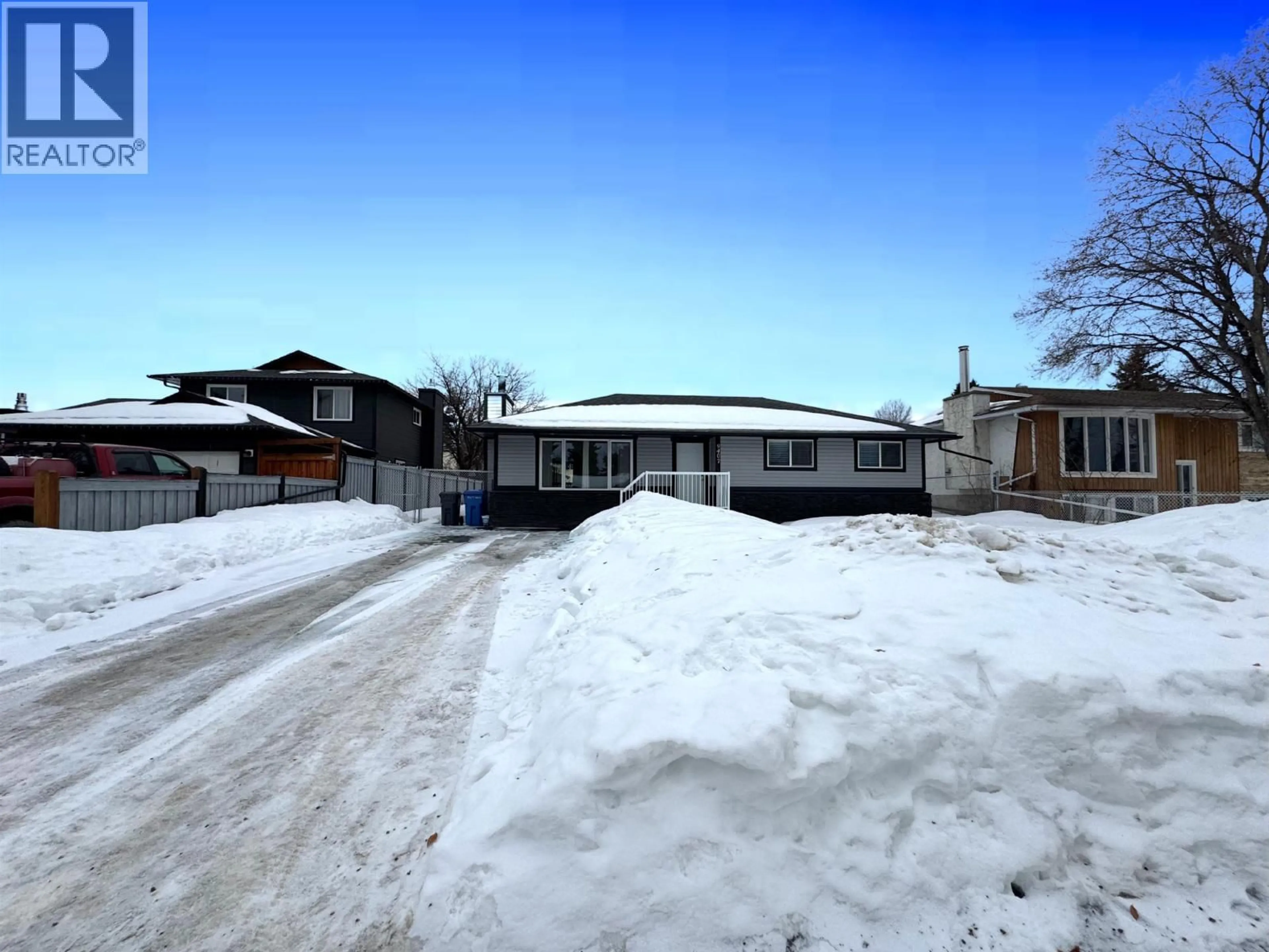 A pic from outside/outdoor area/front of a property/back of a property/a pic from drone, street for 9407 106 AVENUE, Fort St. John British Columbia V1J5L4