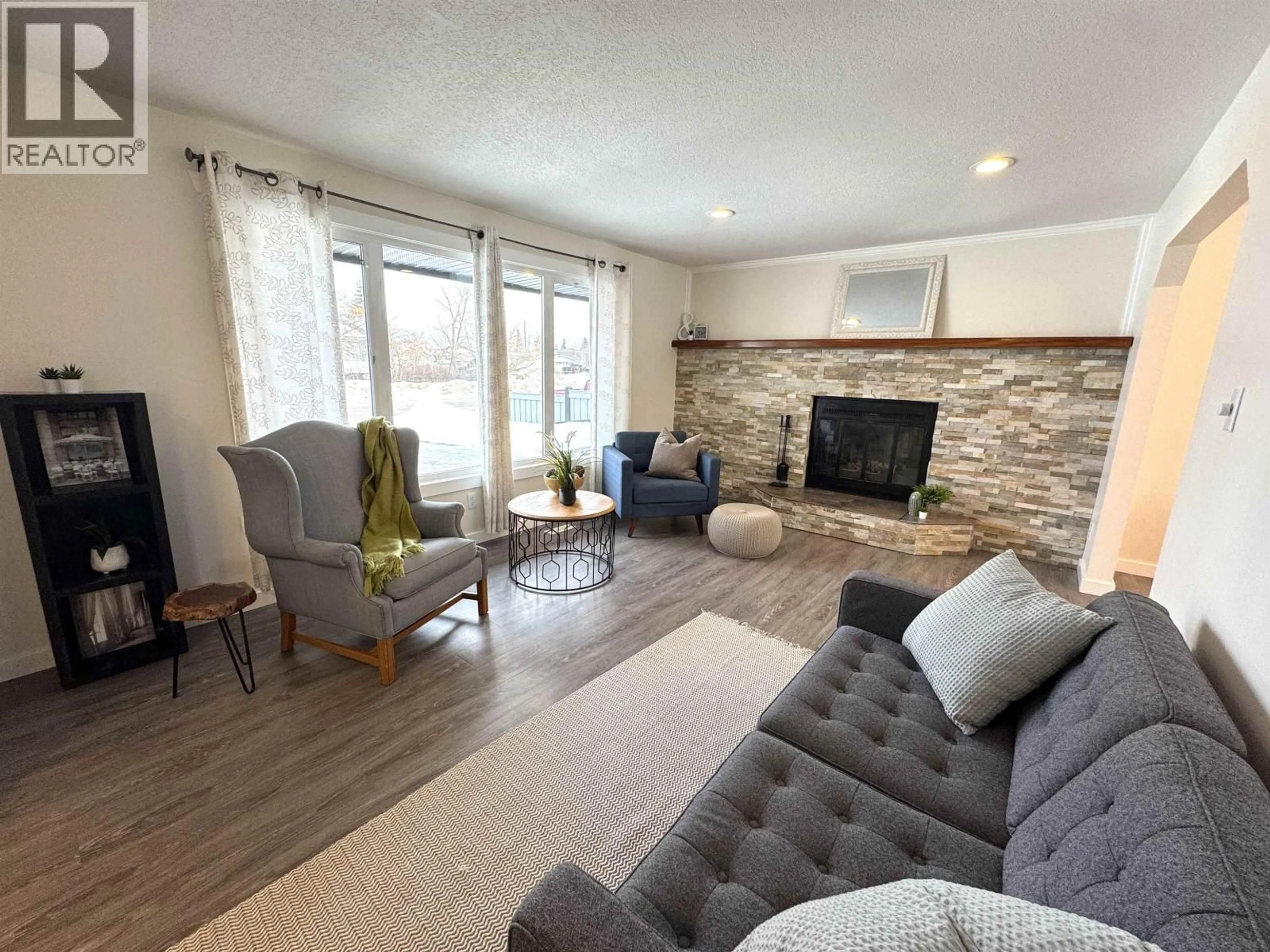 Living room with furniture, unknown for 9407 106 AVENUE, Fort St. John British Columbia V1J5L4