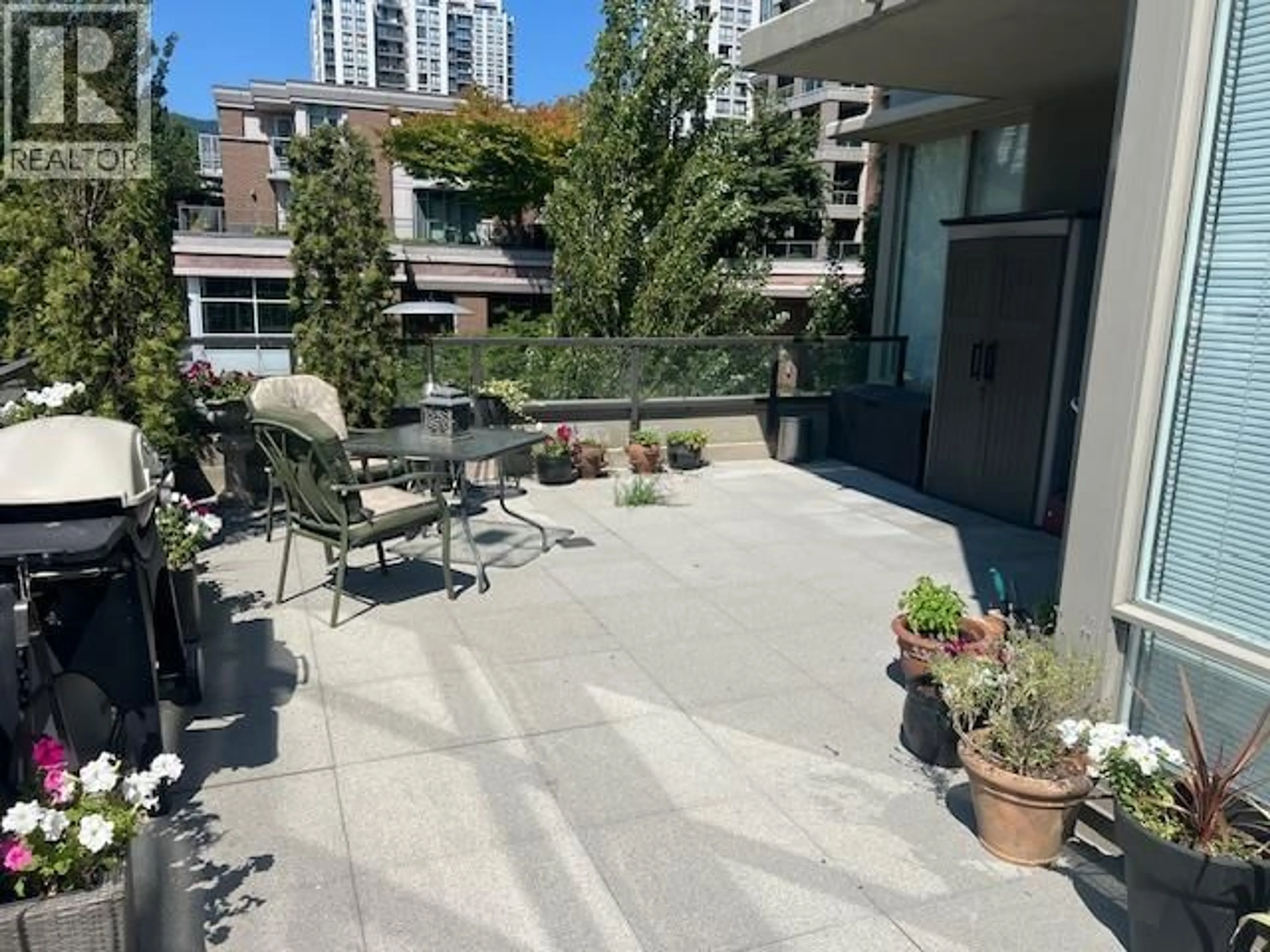Patio, city buildings view from balcony for 301 - 2980 ATLANTIC AVENUE, Coquitlam British Columbia V3B0G2