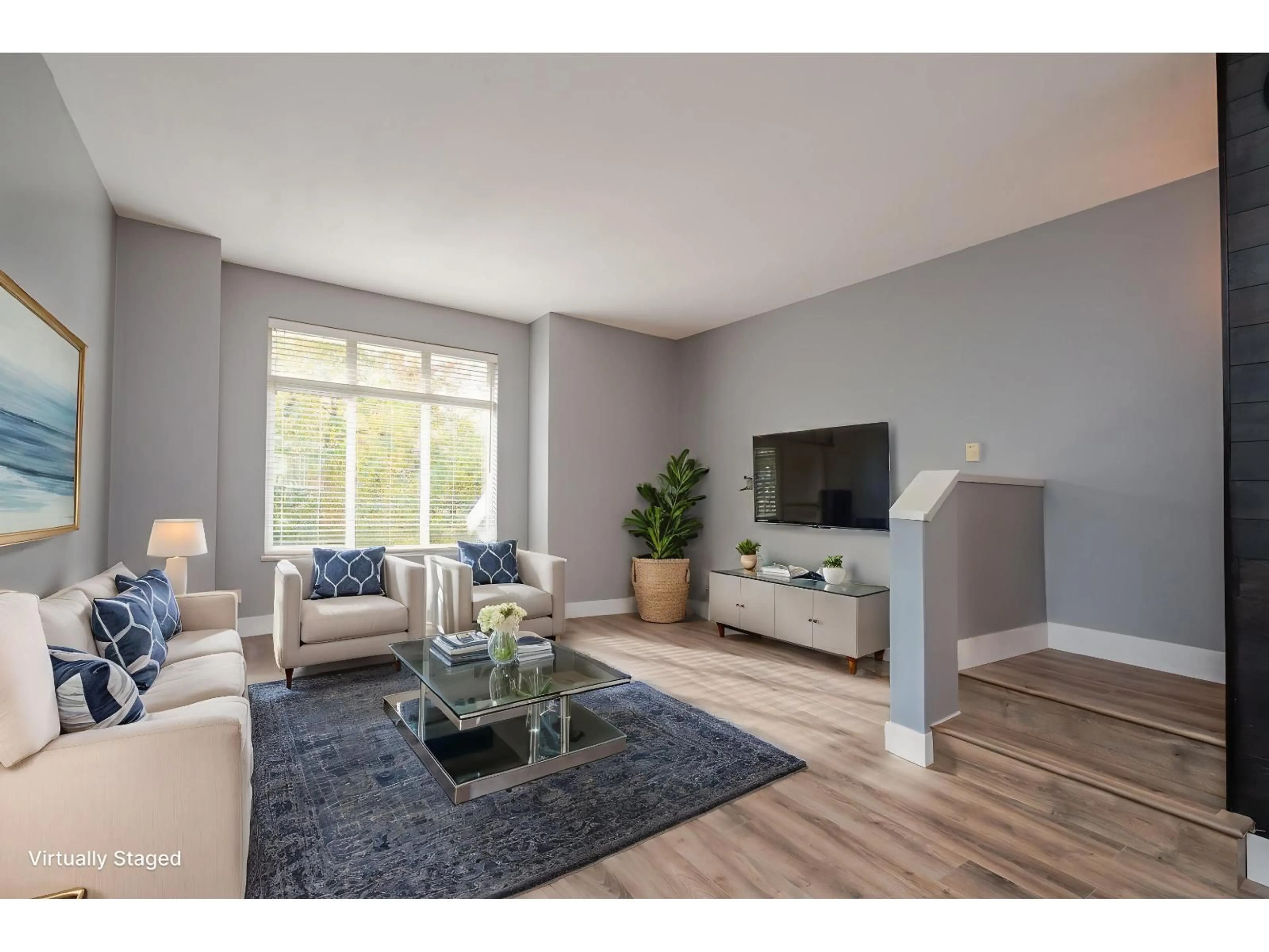 Living room with furniture, wood/laminate floor for 77 - 19433 68 AVENUE, Surrey British Columbia V4N6M8