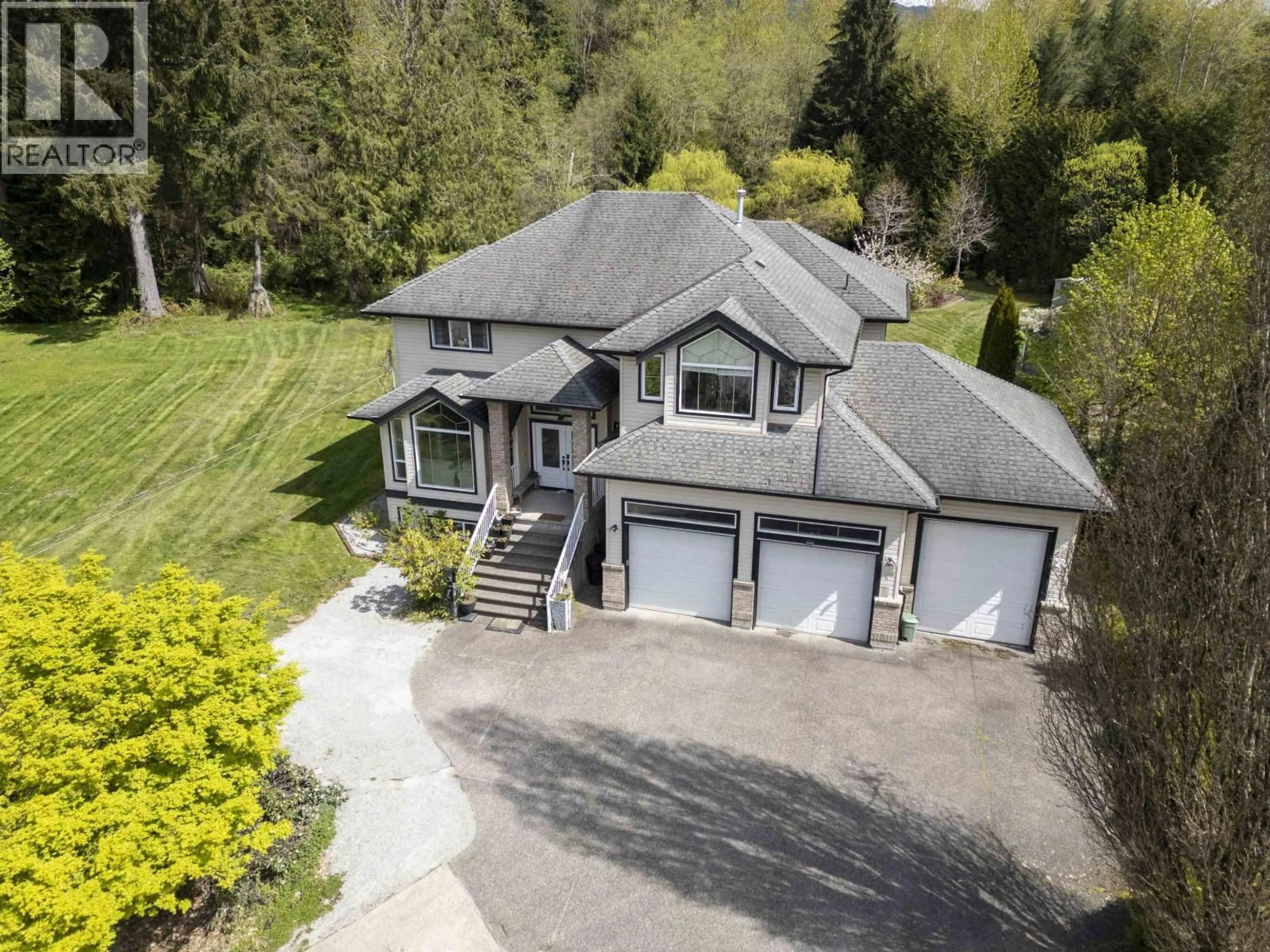 A pic from outside/outdoor area/front of a property/back of a property/a pic from drone, street for 13046 250 STREET, Maple Ridge British Columbia V4R2G1