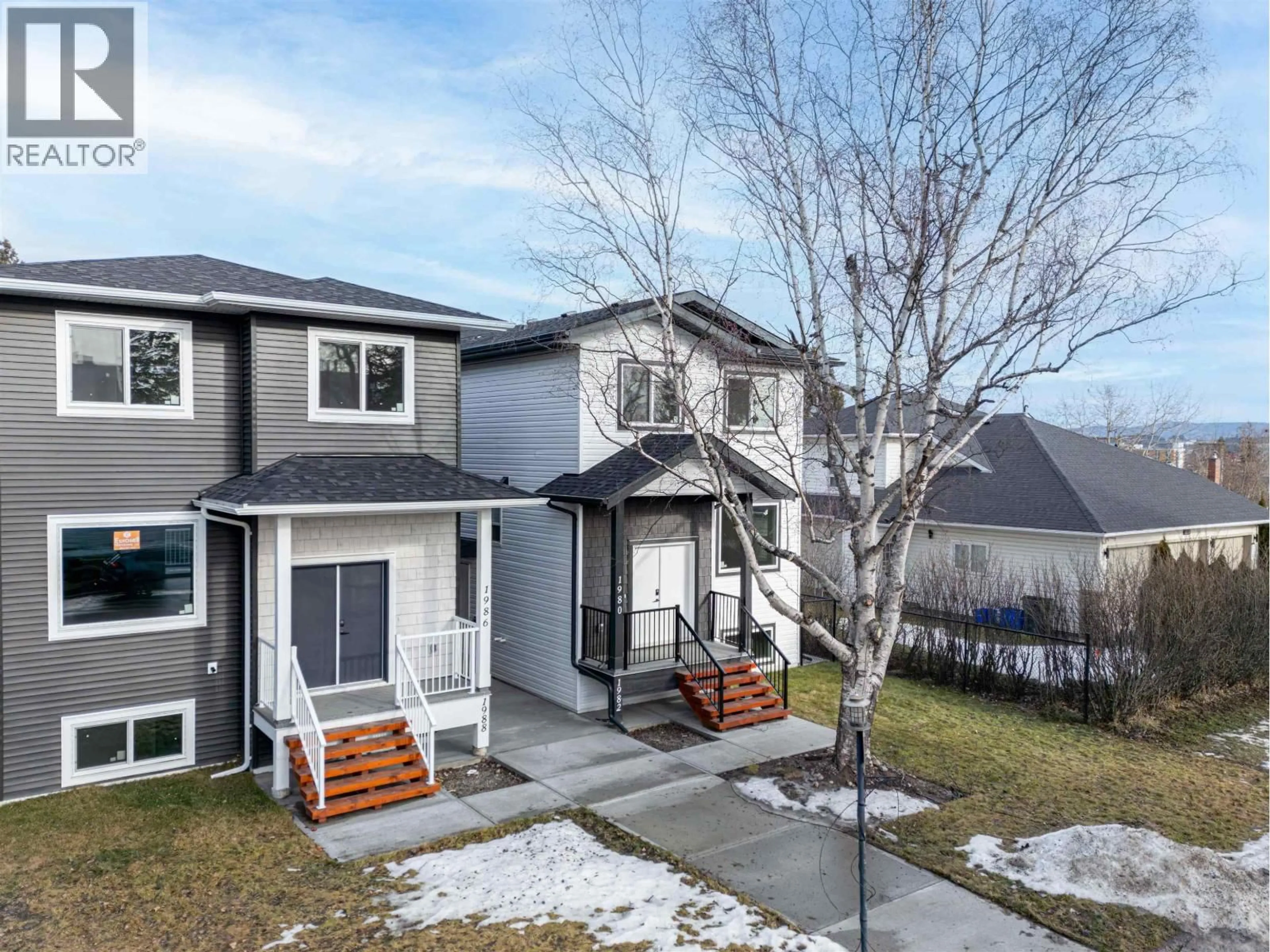 Home with vinyl exterior material, street for 1980 12TH AVENUE, Prince George British Columbia V2M1R9