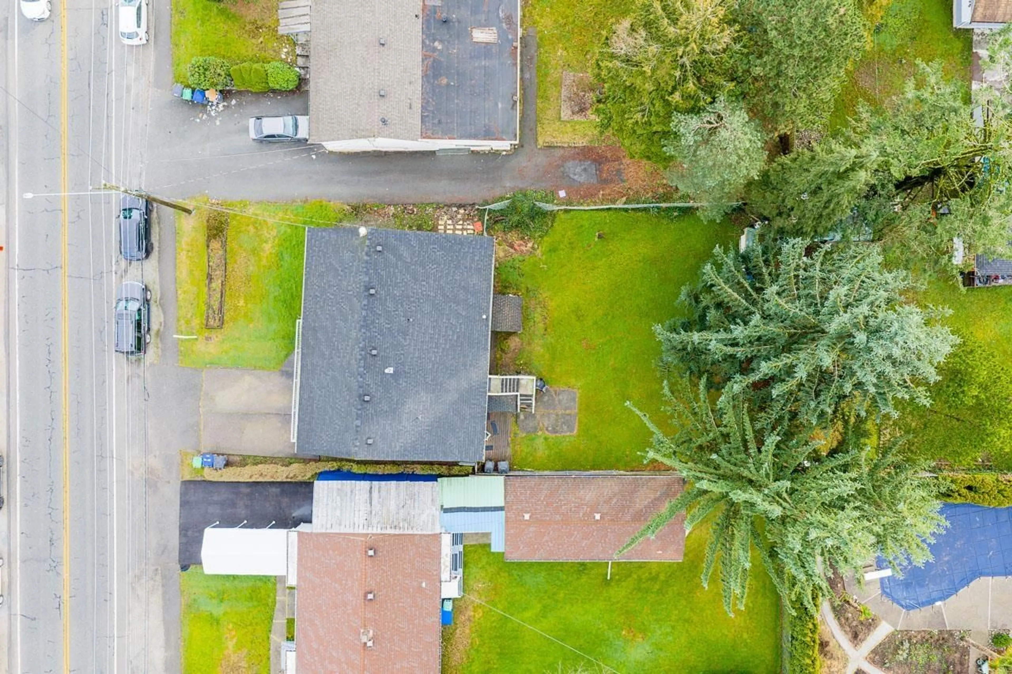 A pic from outside/outdoor area/front of a property/back of a property/a pic from drone, street for 13728 112 AVENUE, Surrey British Columbia V3R2G3