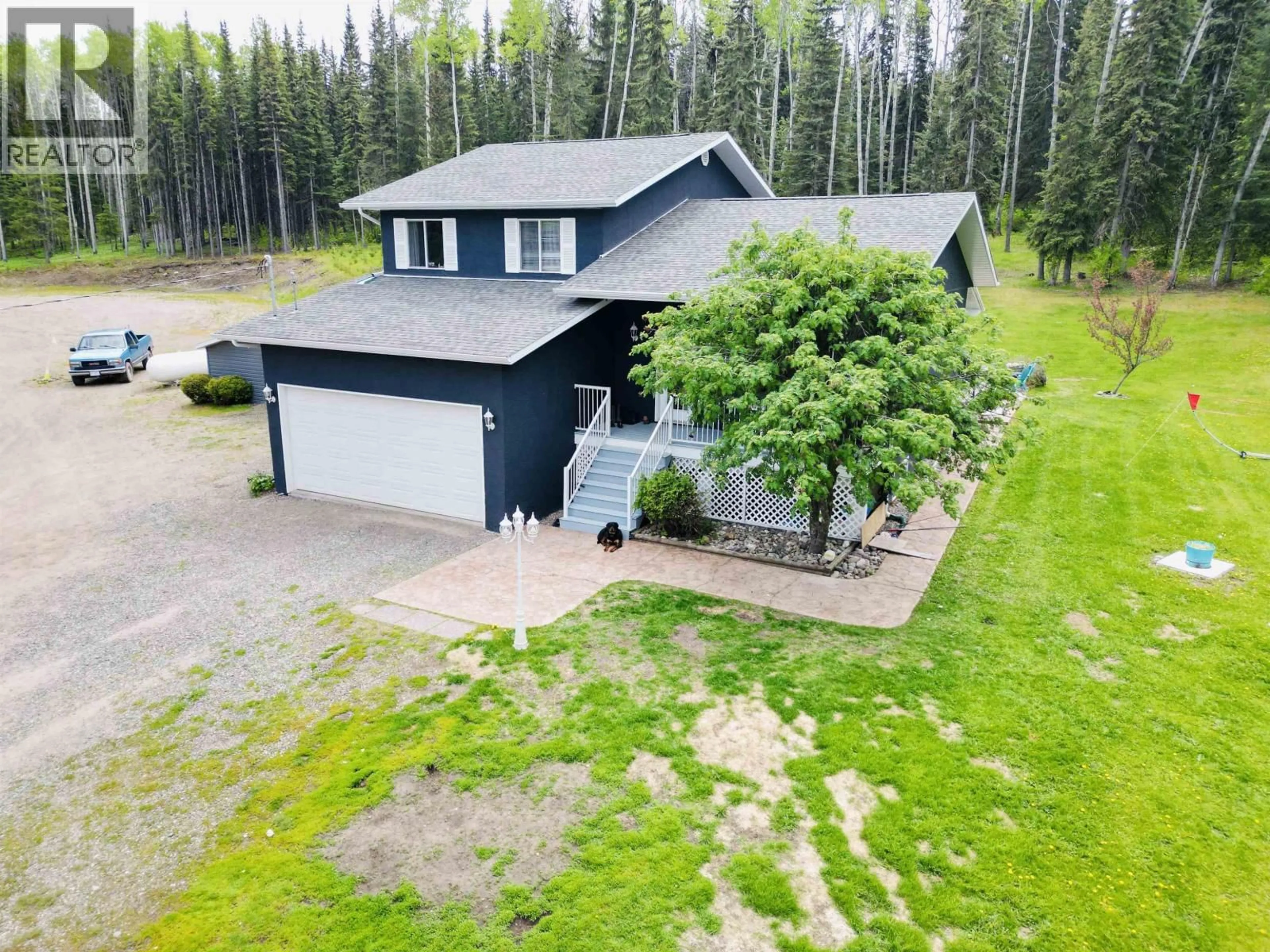 A pic from outside/outdoor area/front of a property/back of a property/a pic from drone, unknown for 415 BEACH ROAD, Burns Lake British Columbia V0J1E2