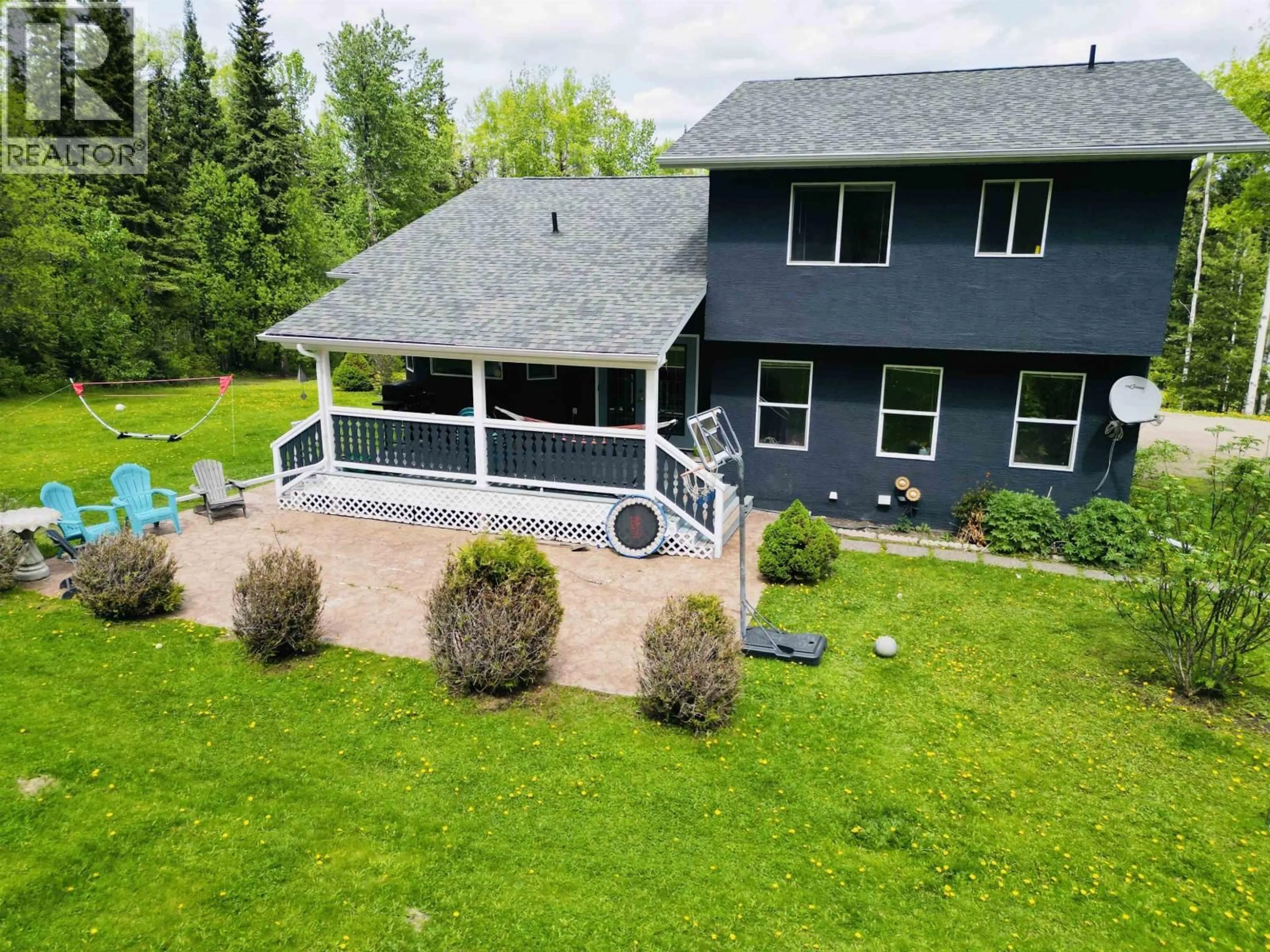 A pic from outside/outdoor area/front of a property/back of a property/a pic from drone, water/lake/river/ocean view for 415 BEACH ROAD, Burns Lake British Columbia V0J1E2